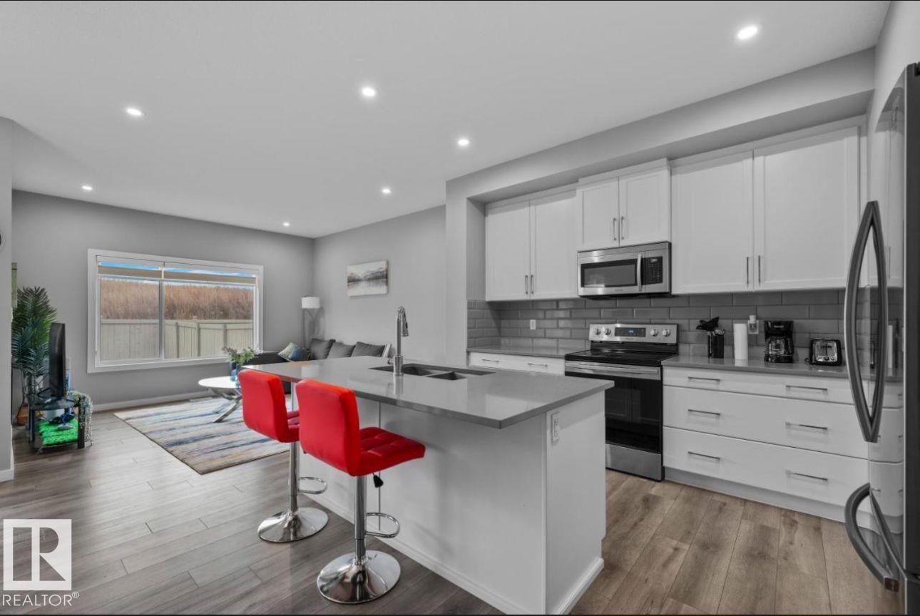 Photo 8 at 243 39 Avenue NW, Maple Crest, Edmonton