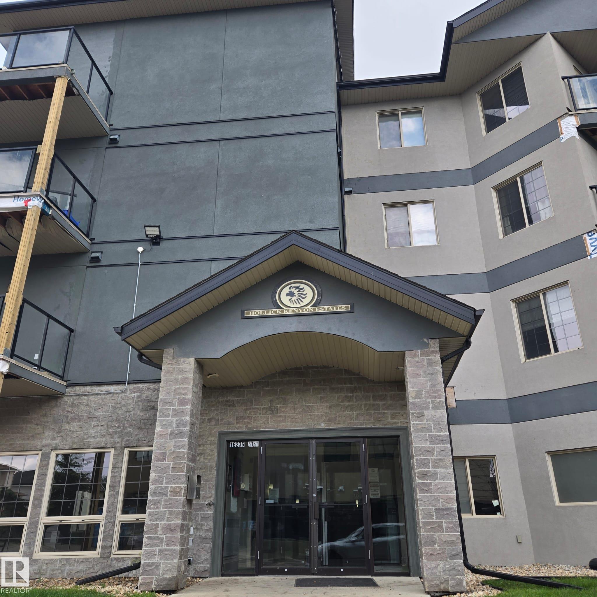 Available June 1st, this ground-floor 2-bedroom, 2-bathroom condo is located in the desirable Hollick-Kenyon community of Northeast Edmonton. The bright, open-concept layout features a modern kitchen with granite countertops, ceramic backsplash, and stainless-steel appliances, opening into a spacious living area designed for comfortable everyday living. The functional floor plan offers privacy with bedrooms located on opposite sides of the unit. Additional features include in-suite laundry, crown mouldings, and a private patio with direct outdoor access. The well-managed building offers amenities including a fitness centre, sauna, social room, and titled underground parking. Conveniently located close to Manning Town Centre, Clareview Recreation Centre, schools, parks, public transit, and LRT access, with easy connectivity to Anthony Henday Drive. Small pets are subject to approval.