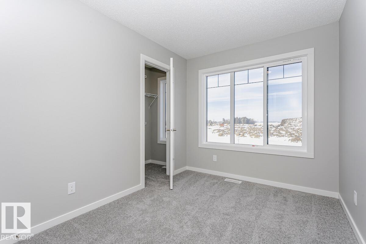 Photo 8 at 344 Hawthorn Way, Woodbend, Leduc