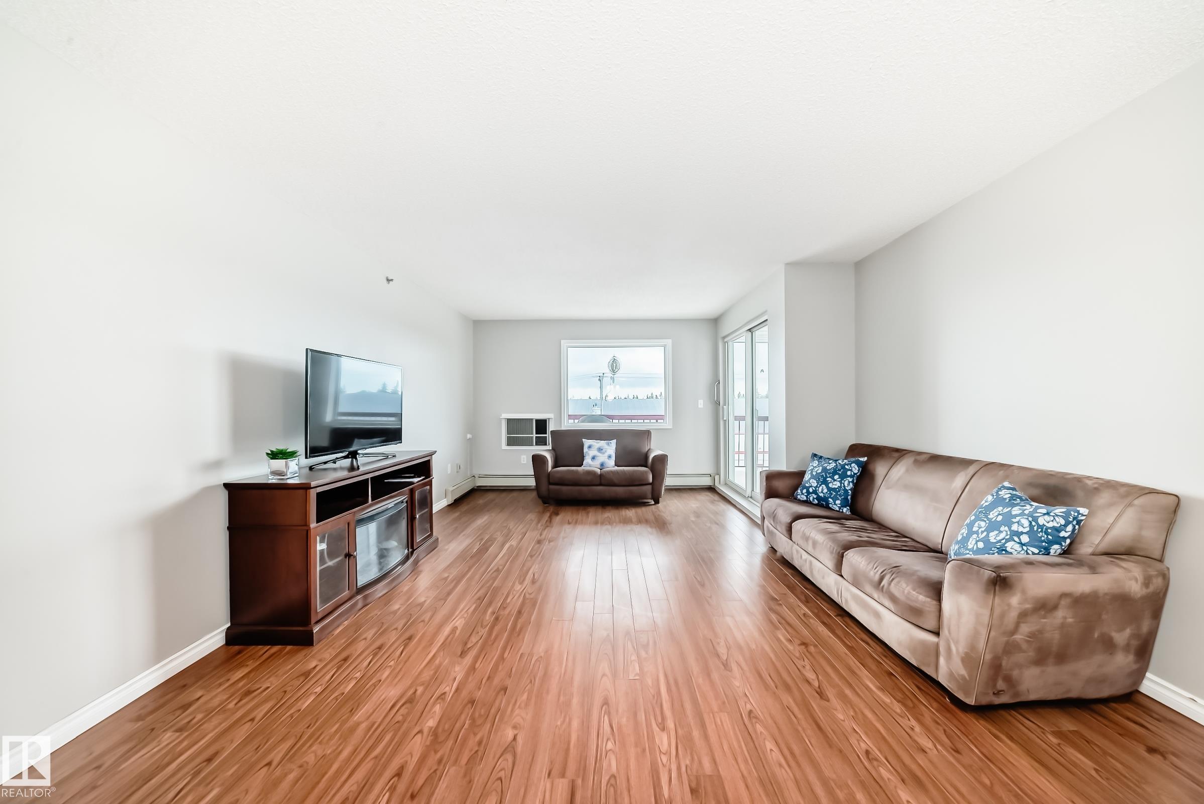Photo 17 at 311 - 4906 47 Avenue, Central Business District, Leduc