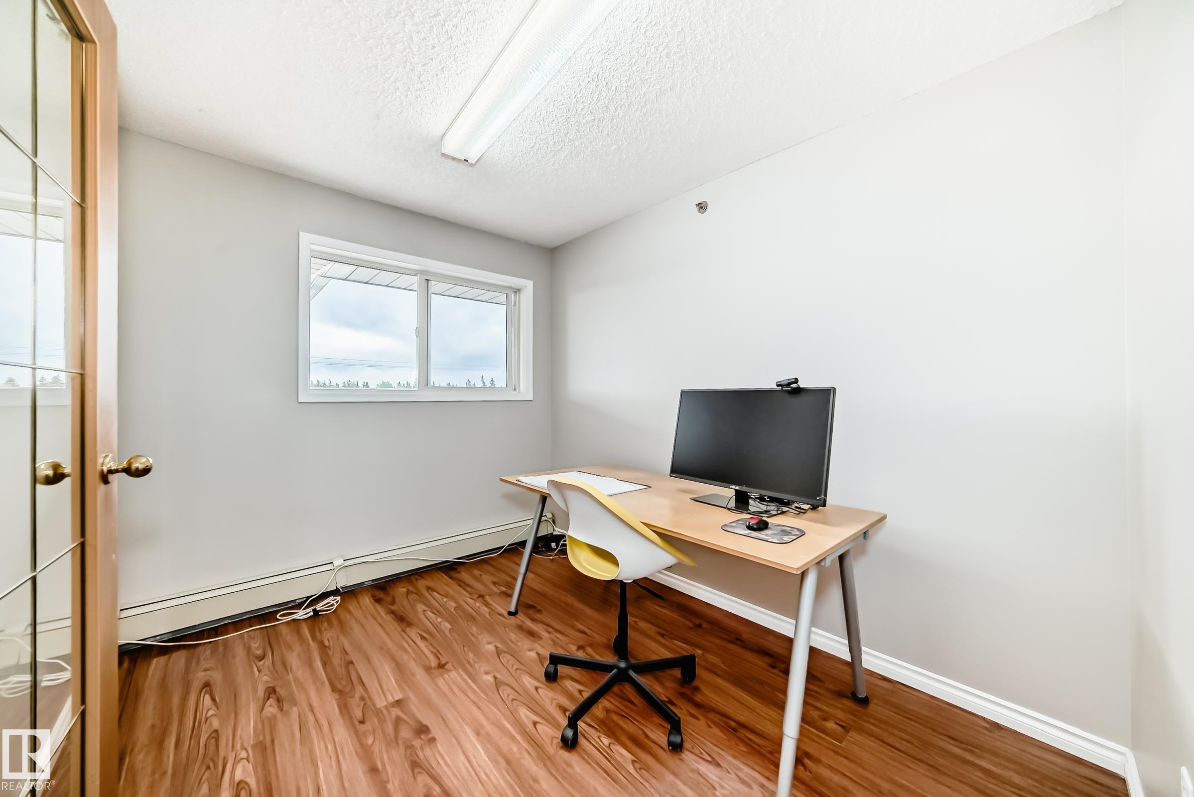 Photo 31 at 311 - 4906 47 Avenue, Central Business District, Leduc