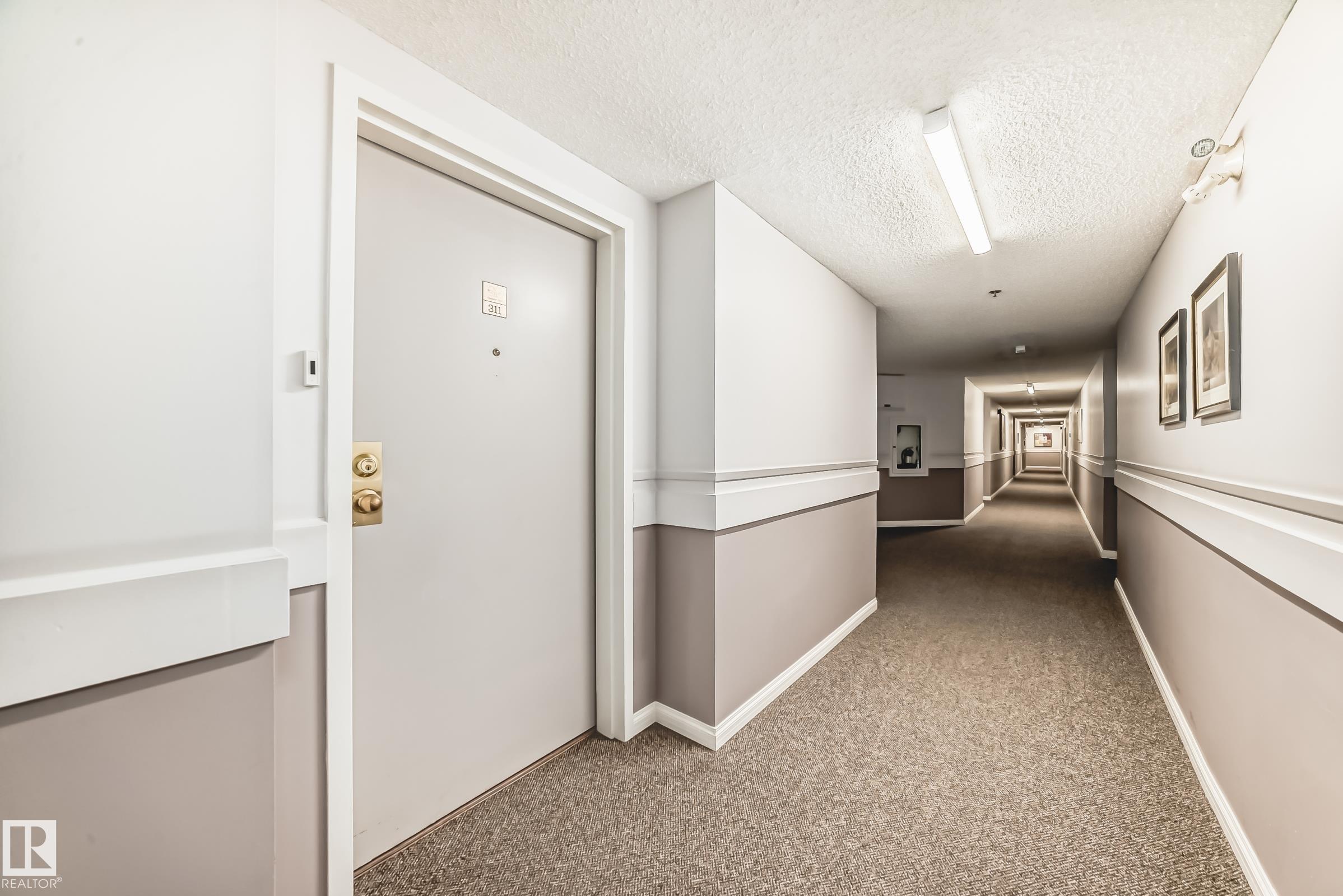 Photo 37 at 311 - 4906 47 Avenue, Central Business District, Leduc