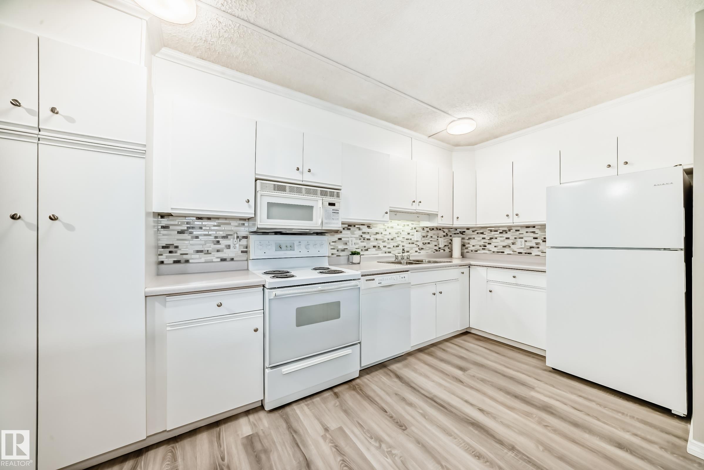 Photo 7 at 311 - 4906 47 Avenue, Central Business District, Leduc