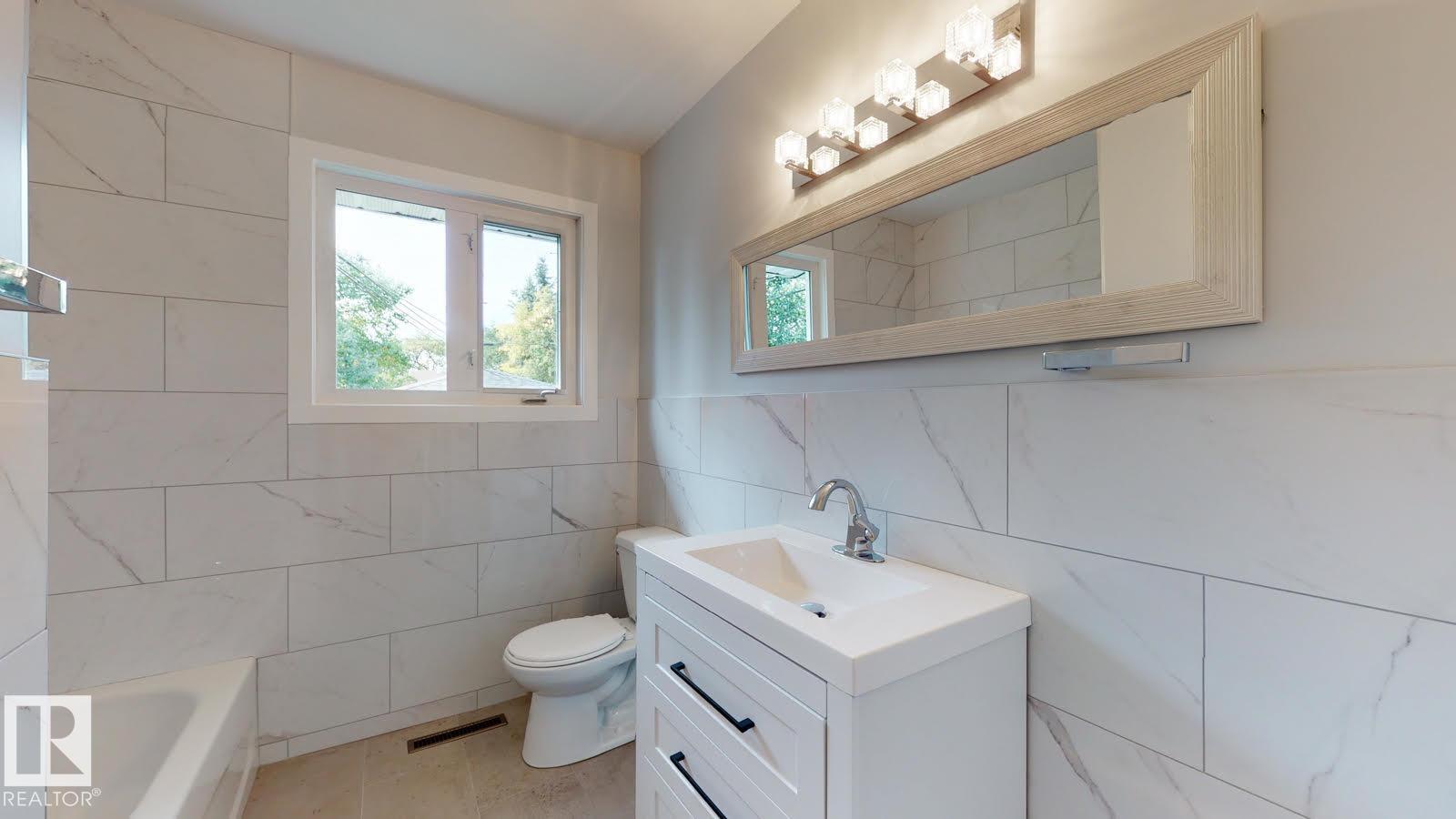 Photo 10 at 11744 135 Street NW, Woodcroft, Edmonton