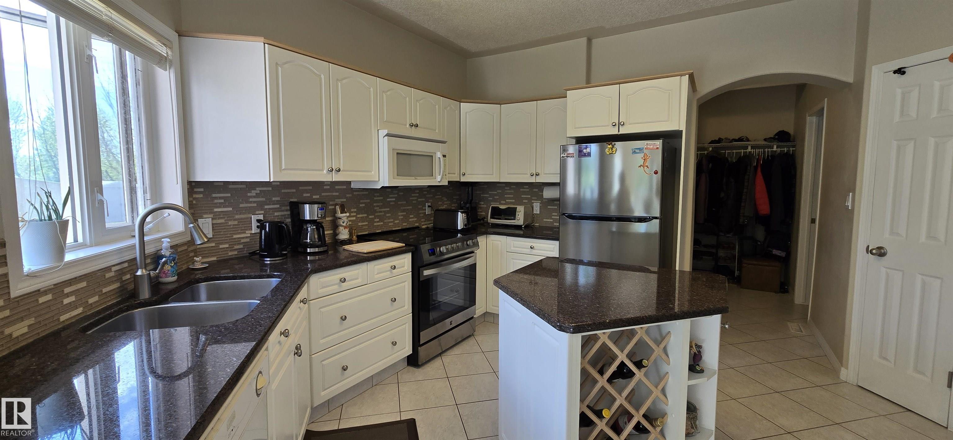 Photo 11 at 11911 231 Street NW, Kinglet Gardens, Edmonton