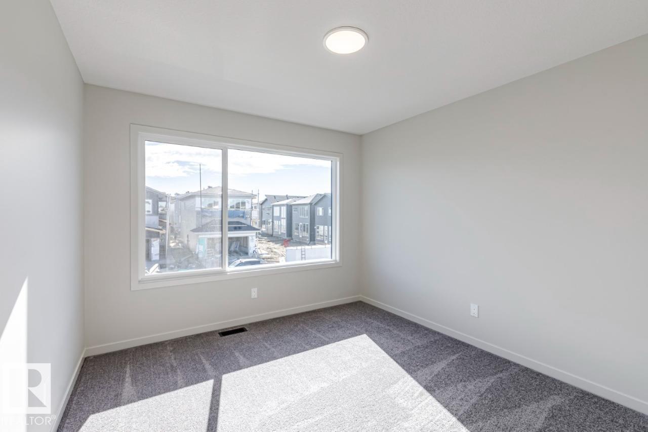 Photo 12 at 7387 Klapstein Crescent SW, Keswick, Edmonton
