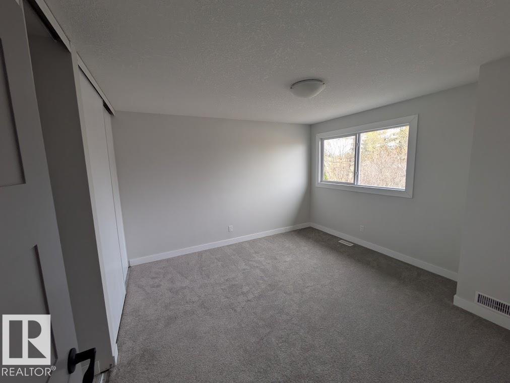 Photo 13 at 703 Grandin Drive, Morinville