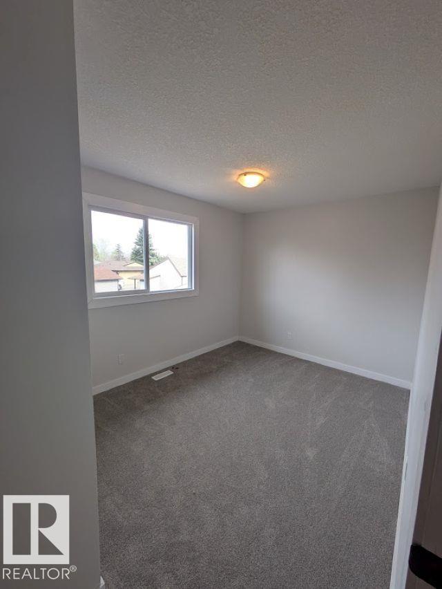 Photo 27 at 703 Grandin Drive, Morinville