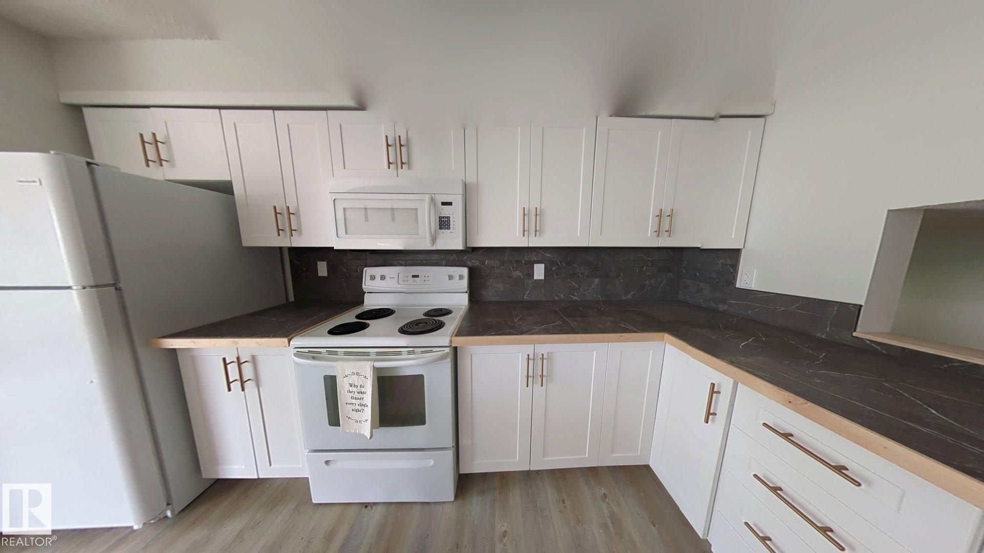Photo 6 at 703 Grandin Drive, Morinville