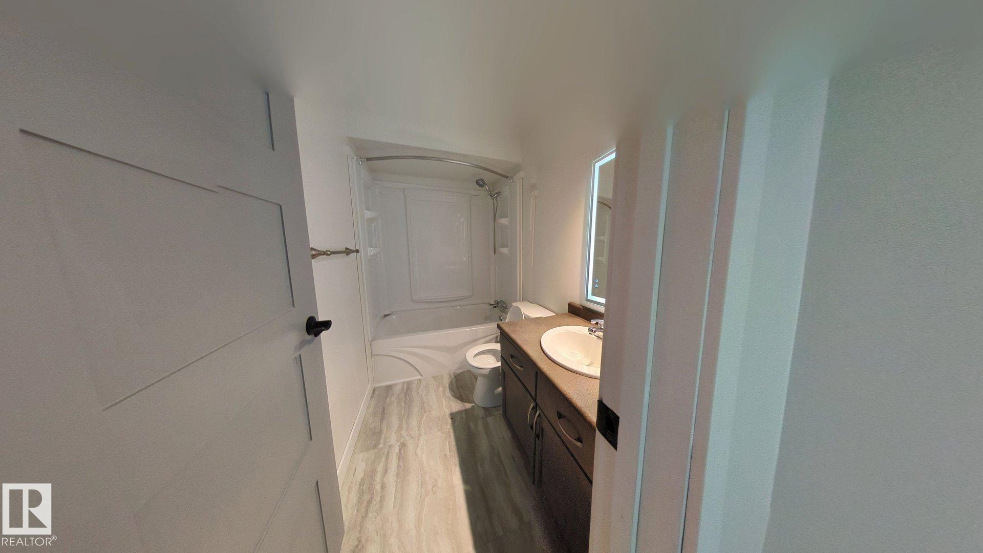 Photo 9 at 703 Grandin Drive, Morinville