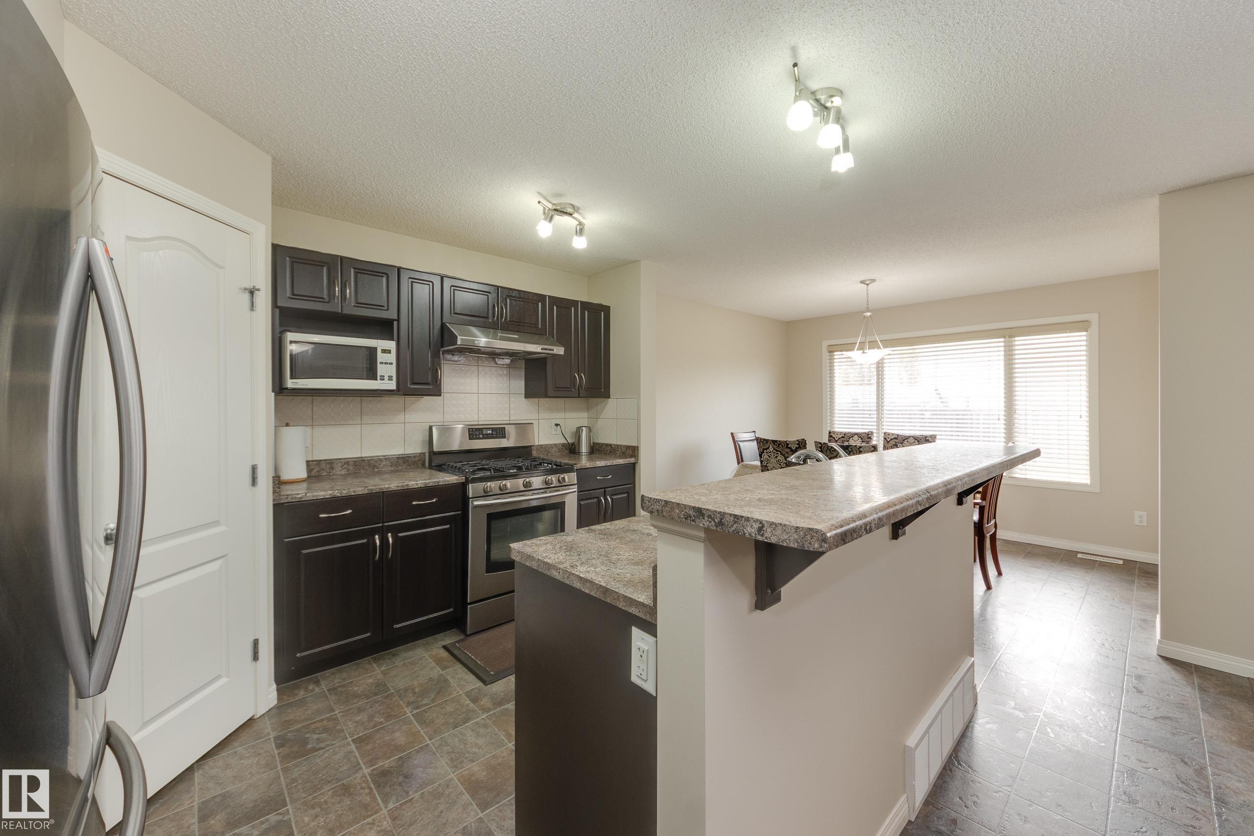 Photo 22 at 1939 118 Street SW, Rutherford, Edmonton