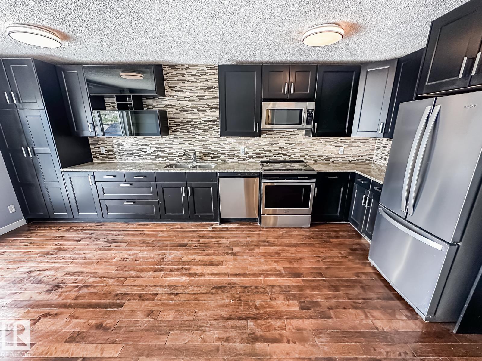Photo 16 at 576 Rainbow Crescent, Regency Park, Sherwood Park