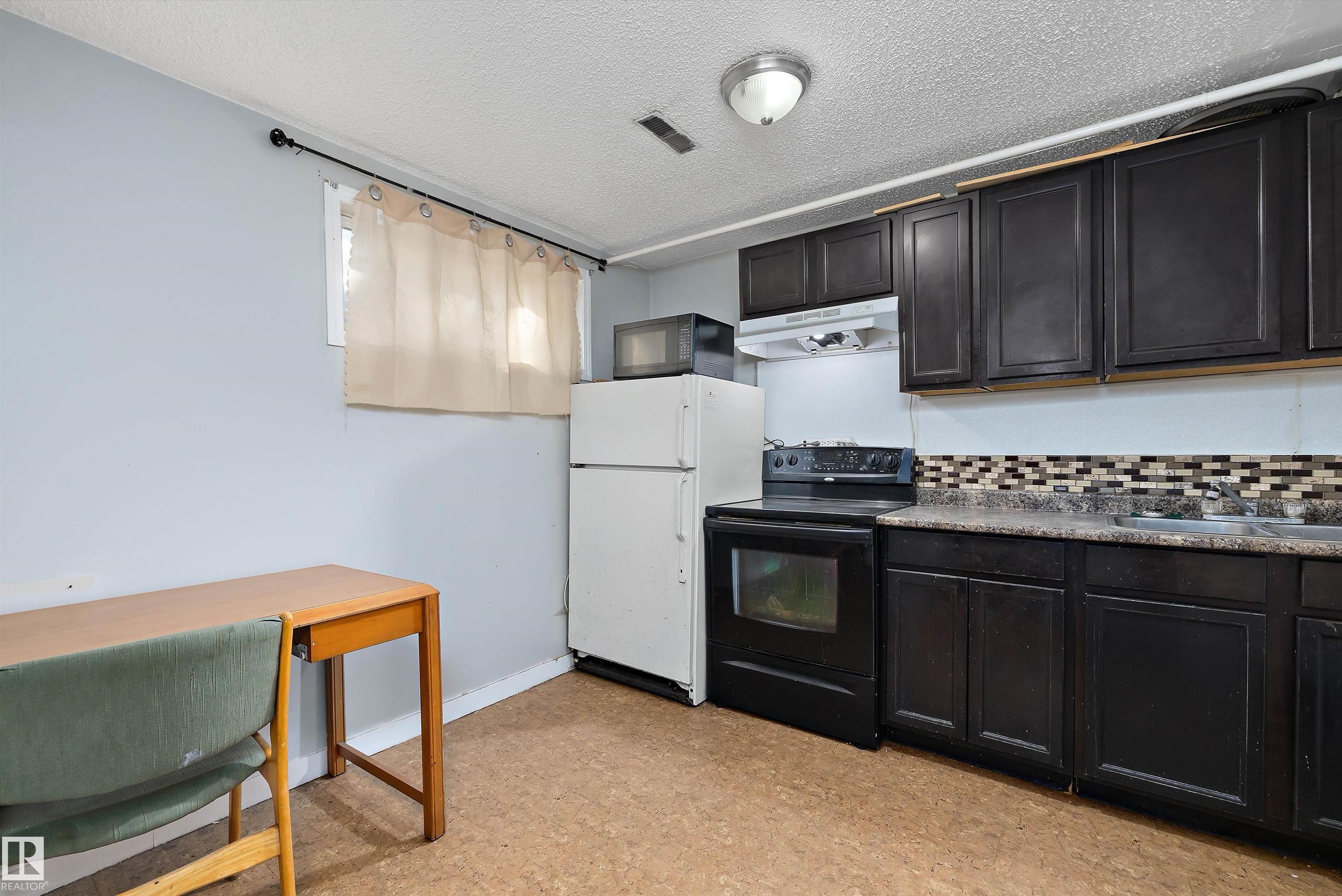 Photo 24 at 12303 115 Avenue NW, Inglewood, Edmonton
