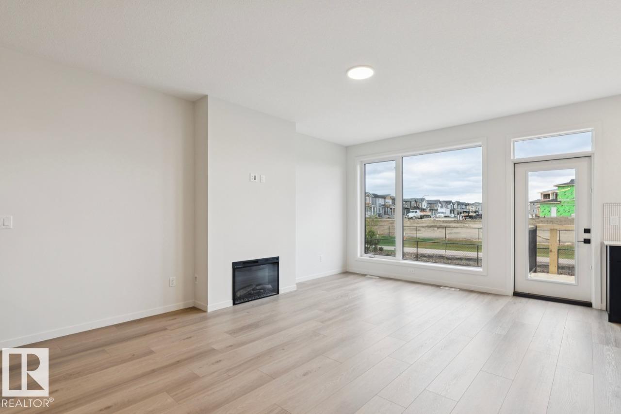Photo 6 at 3019 5 Avenue SW, Alces, Edmonton