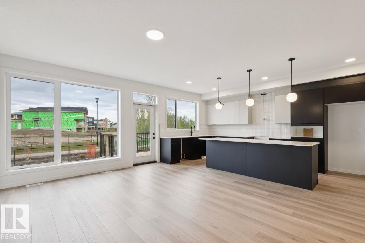 Photo 7 at 3019 5 Avenue SW, Alces, Edmonton