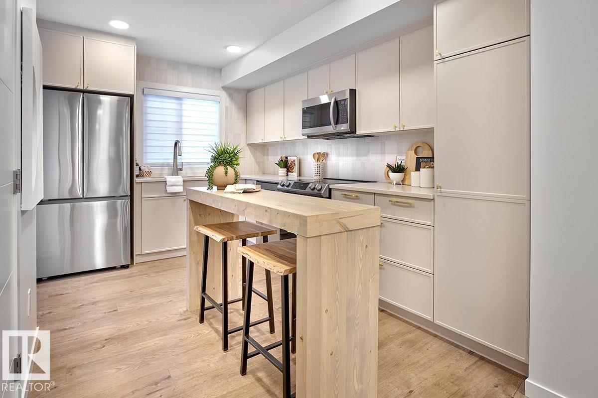 Photo 7 at 3 18640 18 Avenue NW, River's Edge, Edmonton