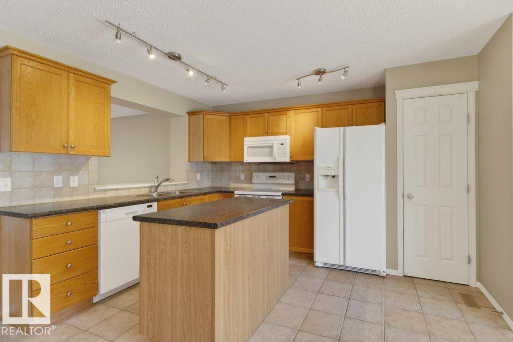 Photo 12 at 12215 18 Avenue SW, Rutherford, Edmonton