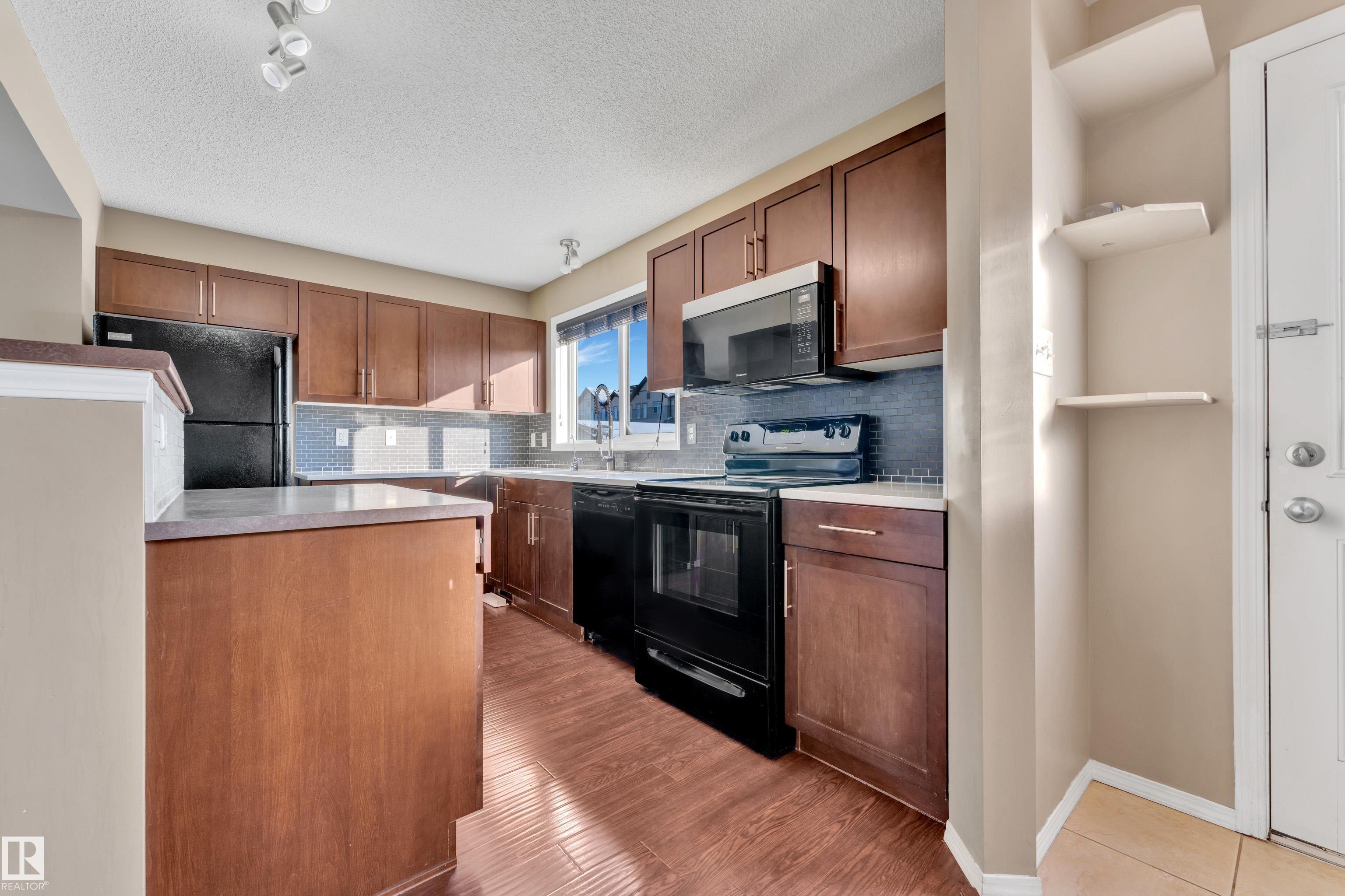 Photo 14 at 6017 213 Street NW, The Hamptons, Edmonton