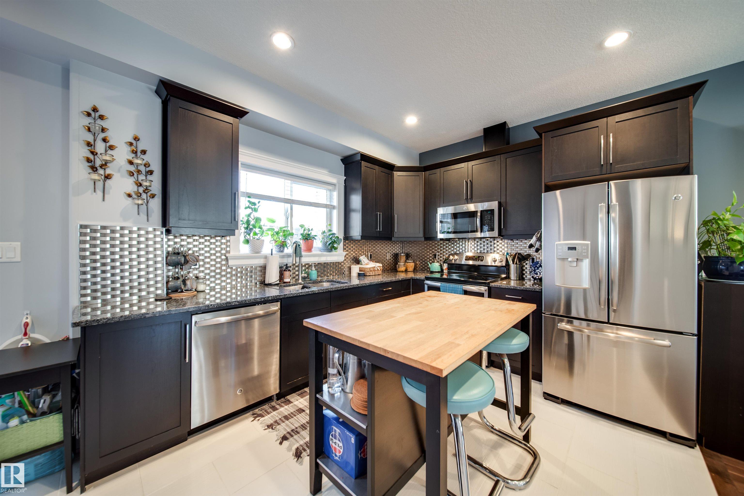 Photo 9 at 12428 113 Avenue NW, Inglewood, Edmonton