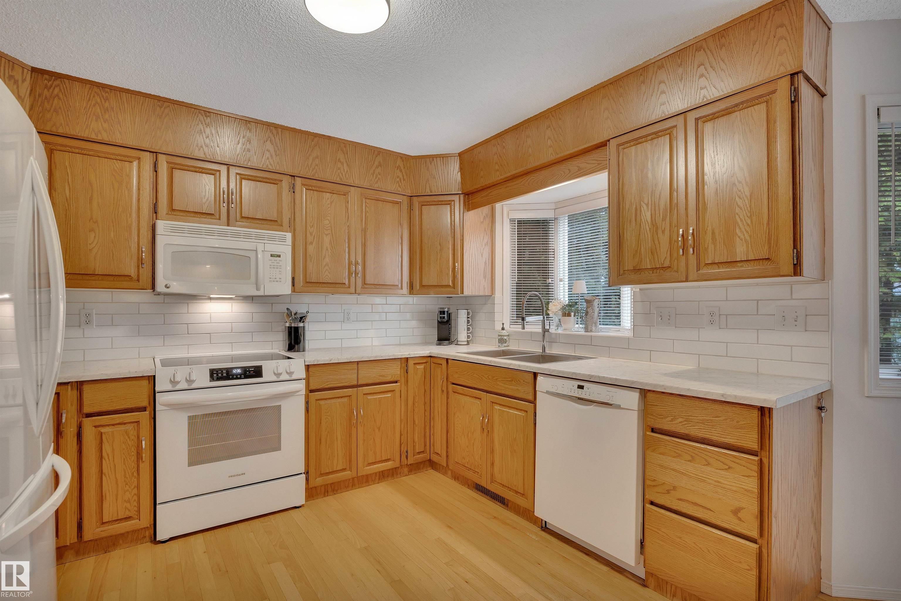 Photo 12 at 10219 174 Avenue NW, Elsinore, Edmonton