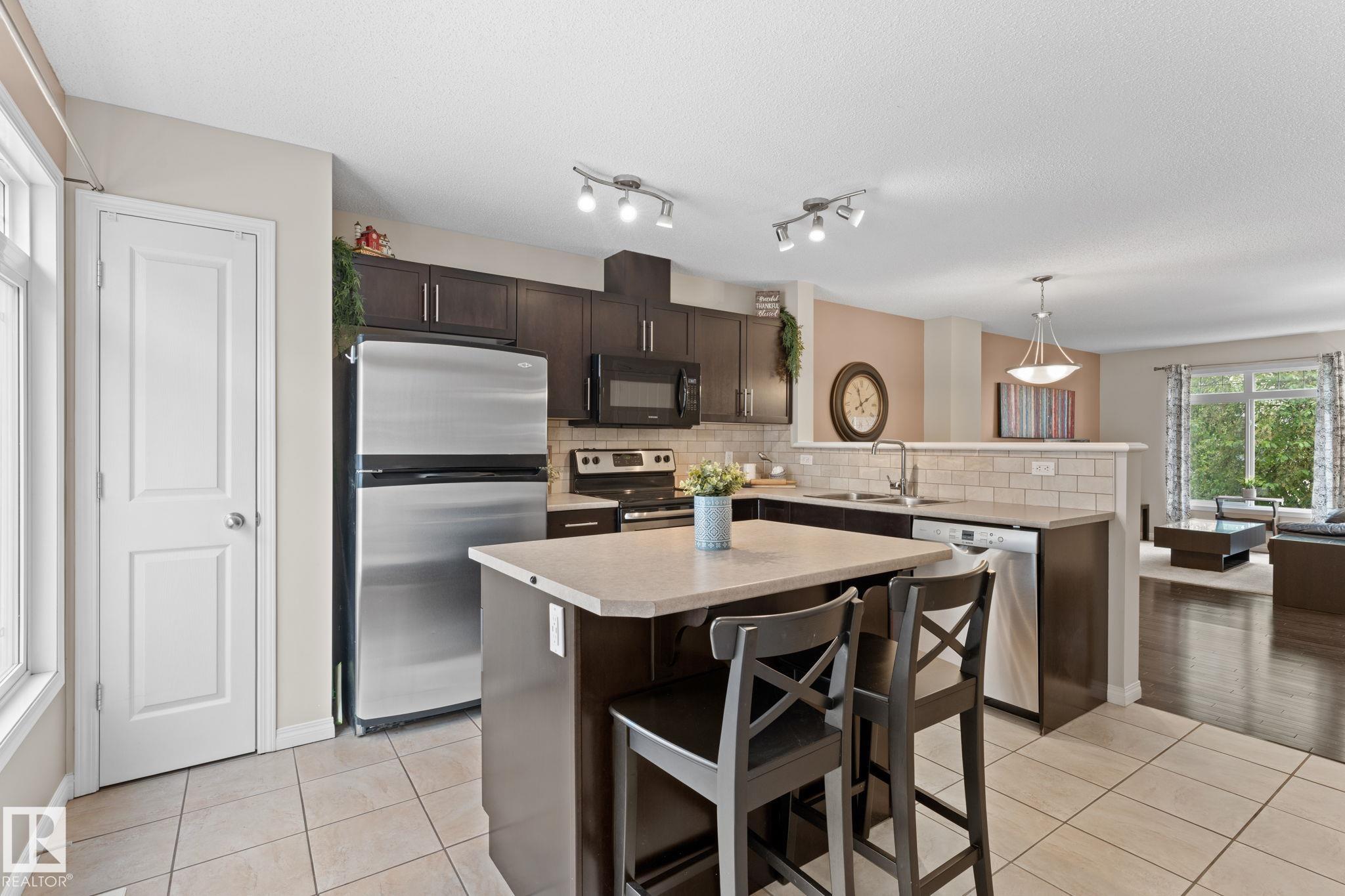 Photo 13 at 58 - 1804 70 Street SW, Summerside, Edmonton
