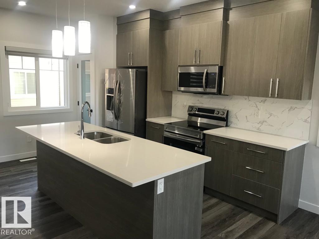 Photo 9 at 10 - 2803 14 Avenue NW, Laurel, Edmonton