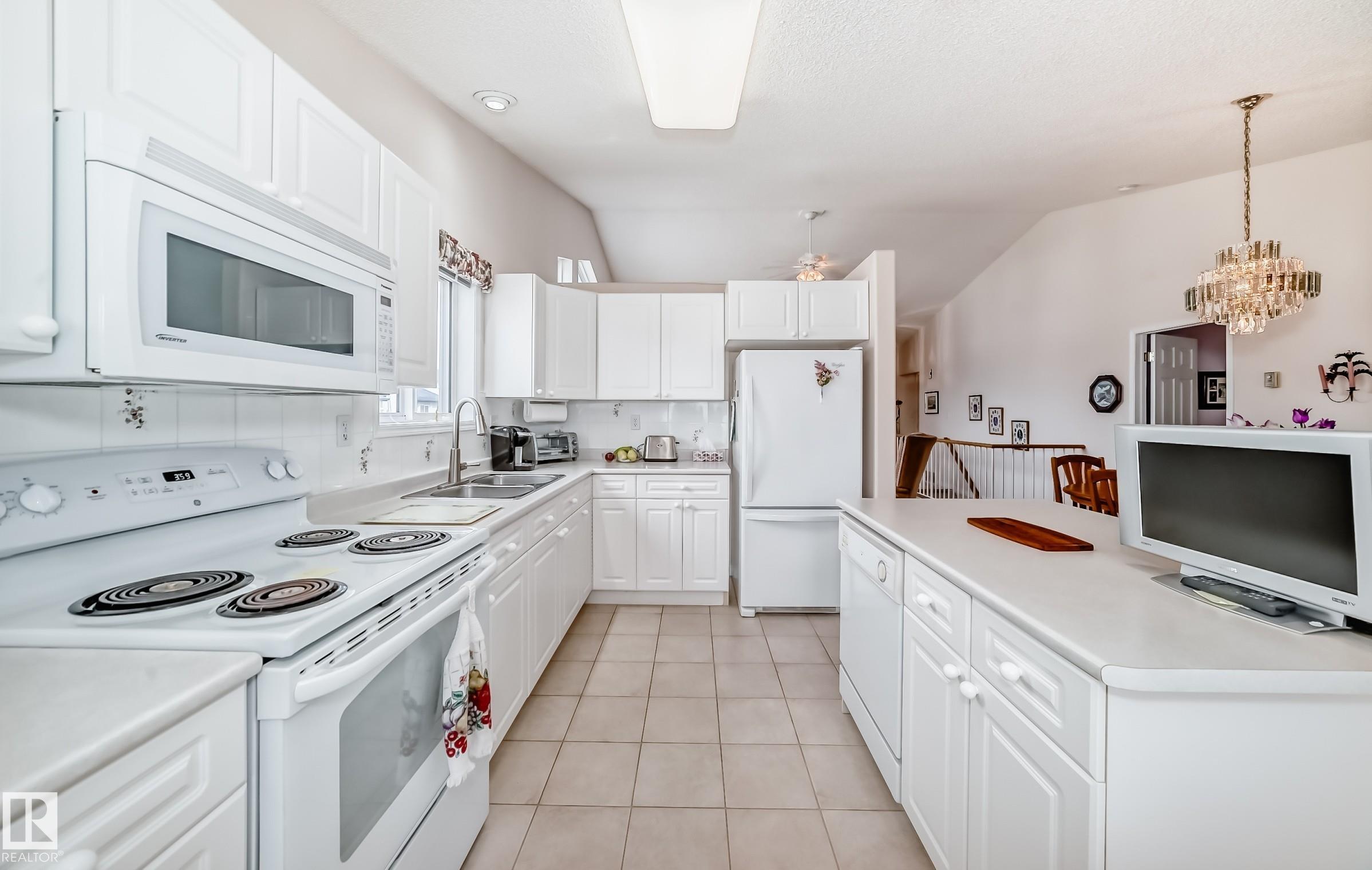 Photo 21 at 49 - 9718 176 Street NW, Terra Losa, Edmonton