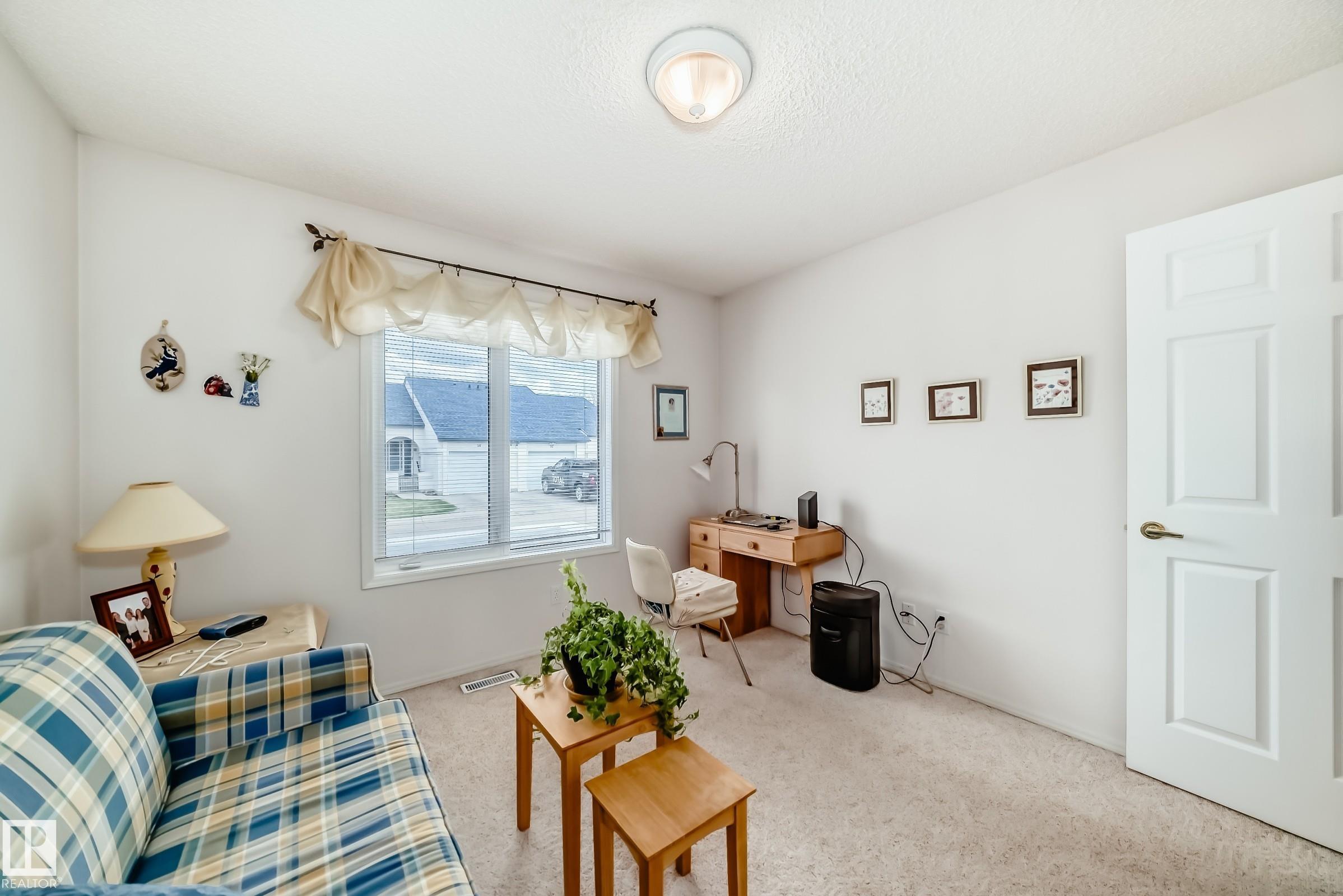 Photo 31 at 49 - 9718 176 Street NW, Terra Losa, Edmonton