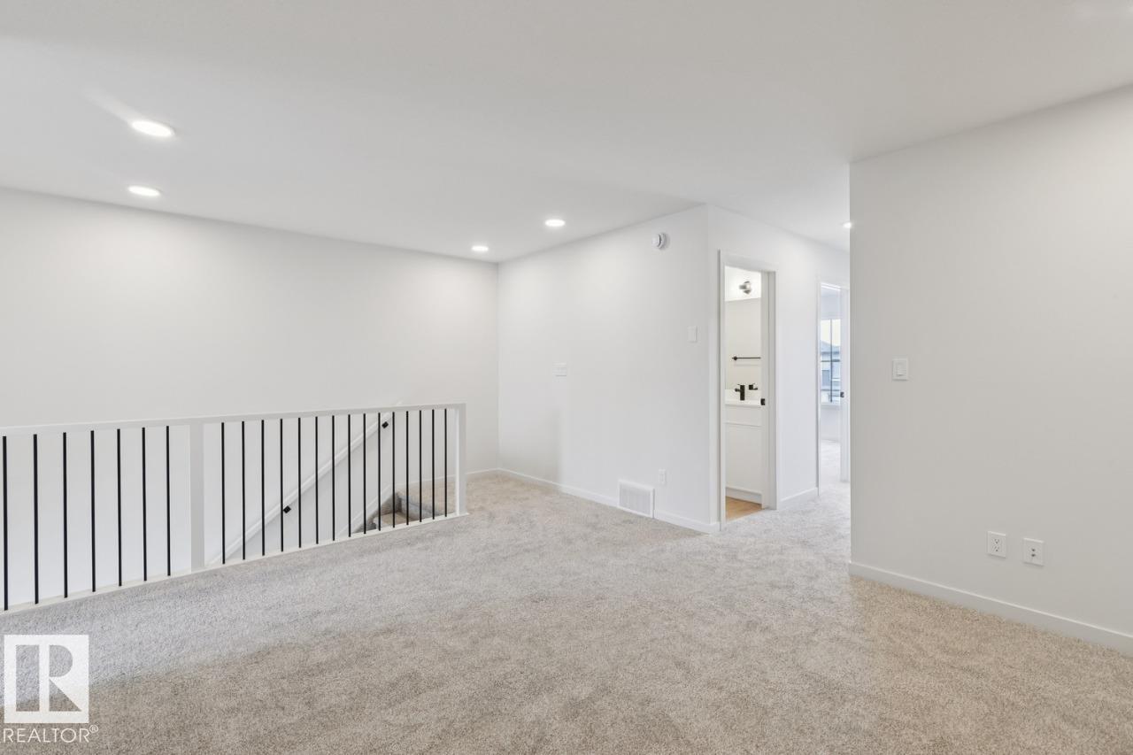 Photo 19 at 428 30 Street SW, Alces, Edmonton