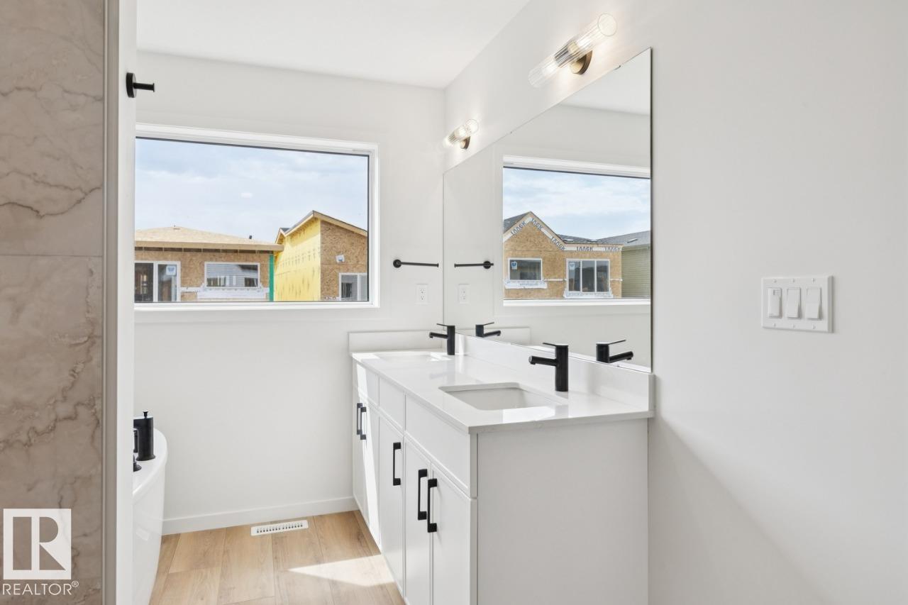 Photo 24 at 428 30 Street SW, Alces, Edmonton