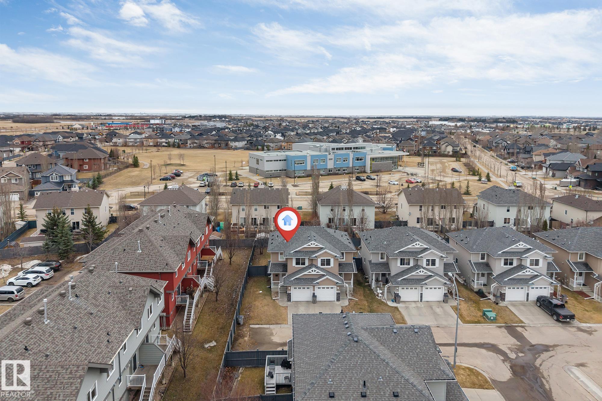 Photo 31 at 10 - 5101 Soleil Boulevard, Place Chaleureuse, Beaumont