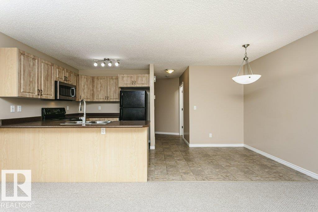 Photo 24 at 21 - 15 Woodsmere Close, Westpark, Fort Saskatchewan