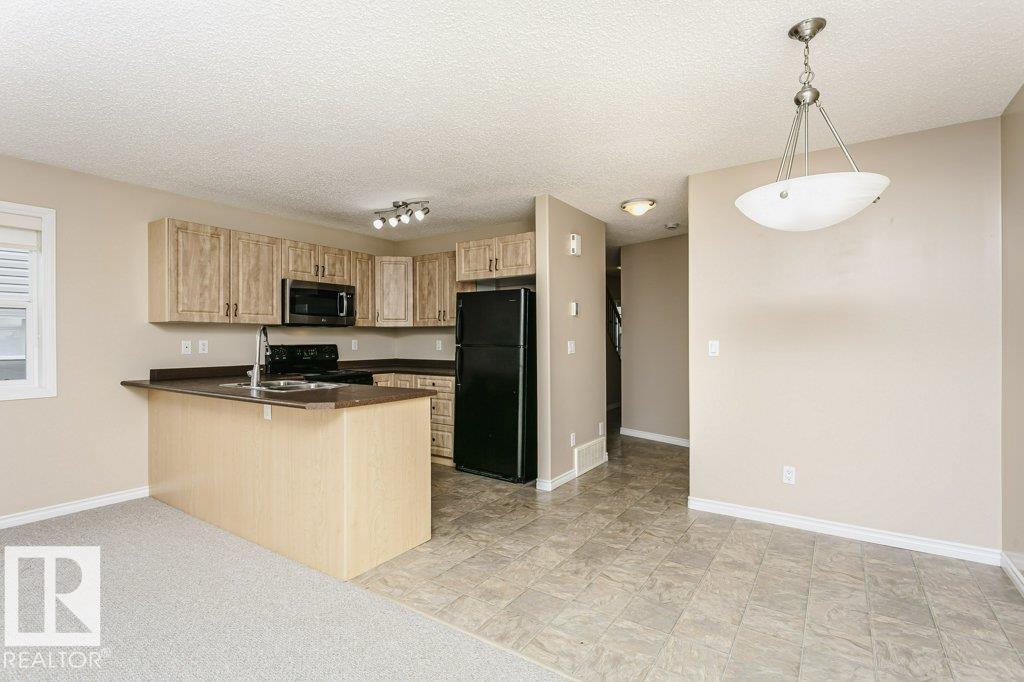 Photo 25 at 21 - 15 Woodsmere Close, Westpark, Fort Saskatchewan