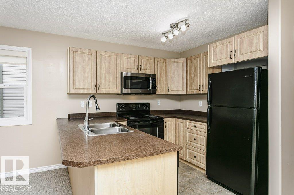 Photo 6 at 21 - 15 Woodsmere Close, Westpark, Fort Saskatchewan