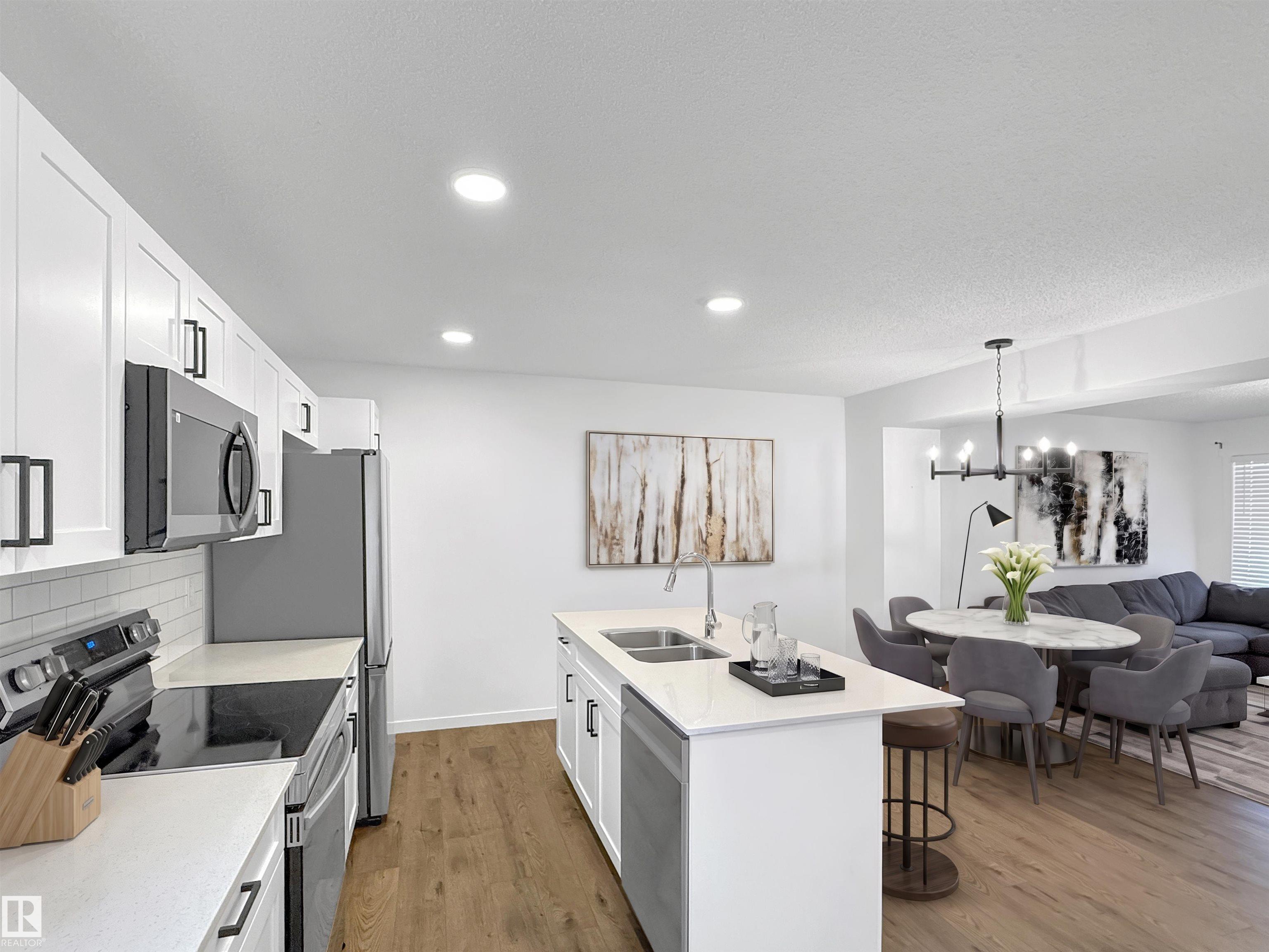 Photo 8 at 46 - 1530 Tamarack Boulevard NW, Tamarack, Edmonton