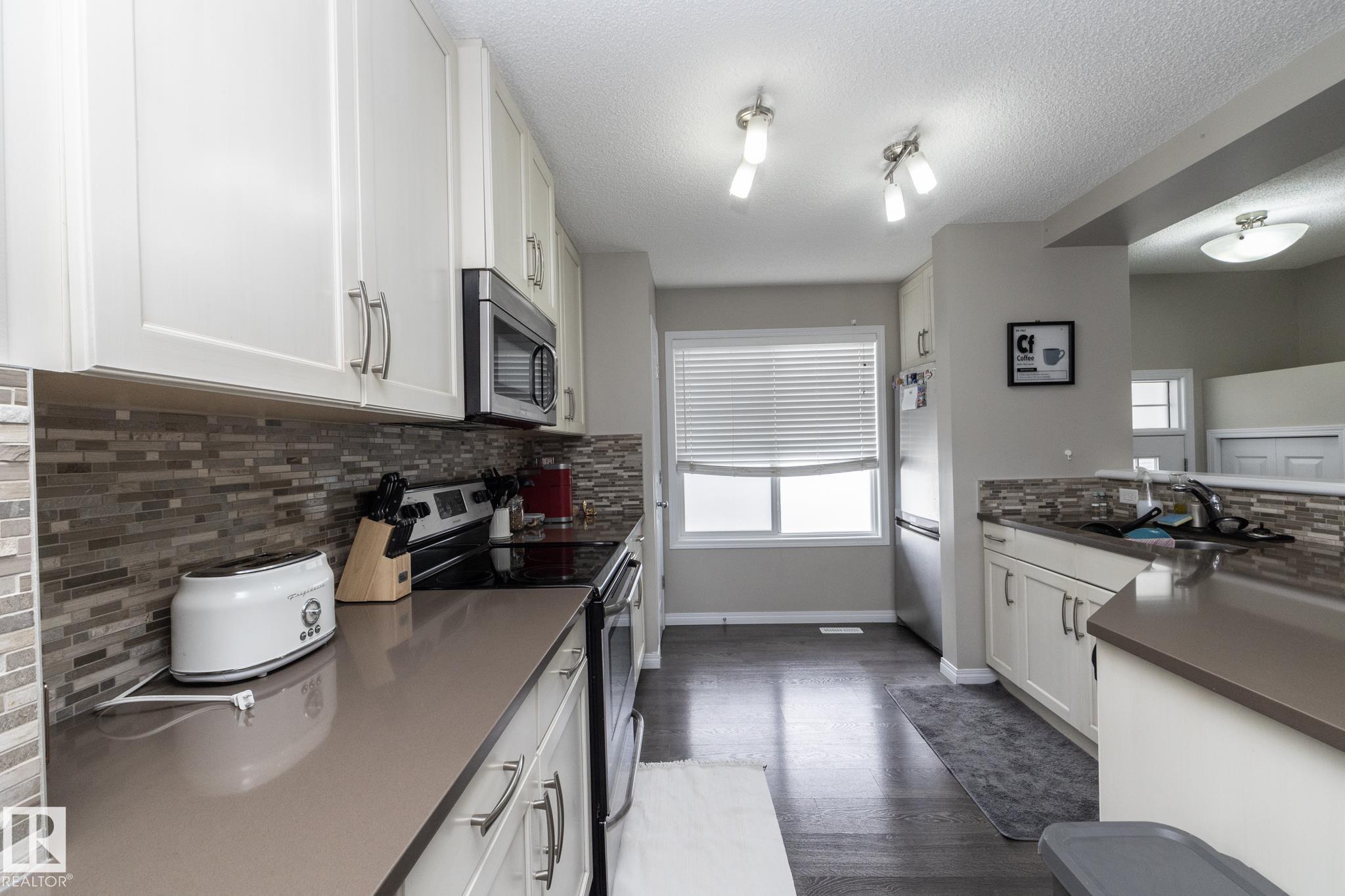 Photo 15 at 46 - 4050 Savaryn Drive SW, Summerside, Edmonton