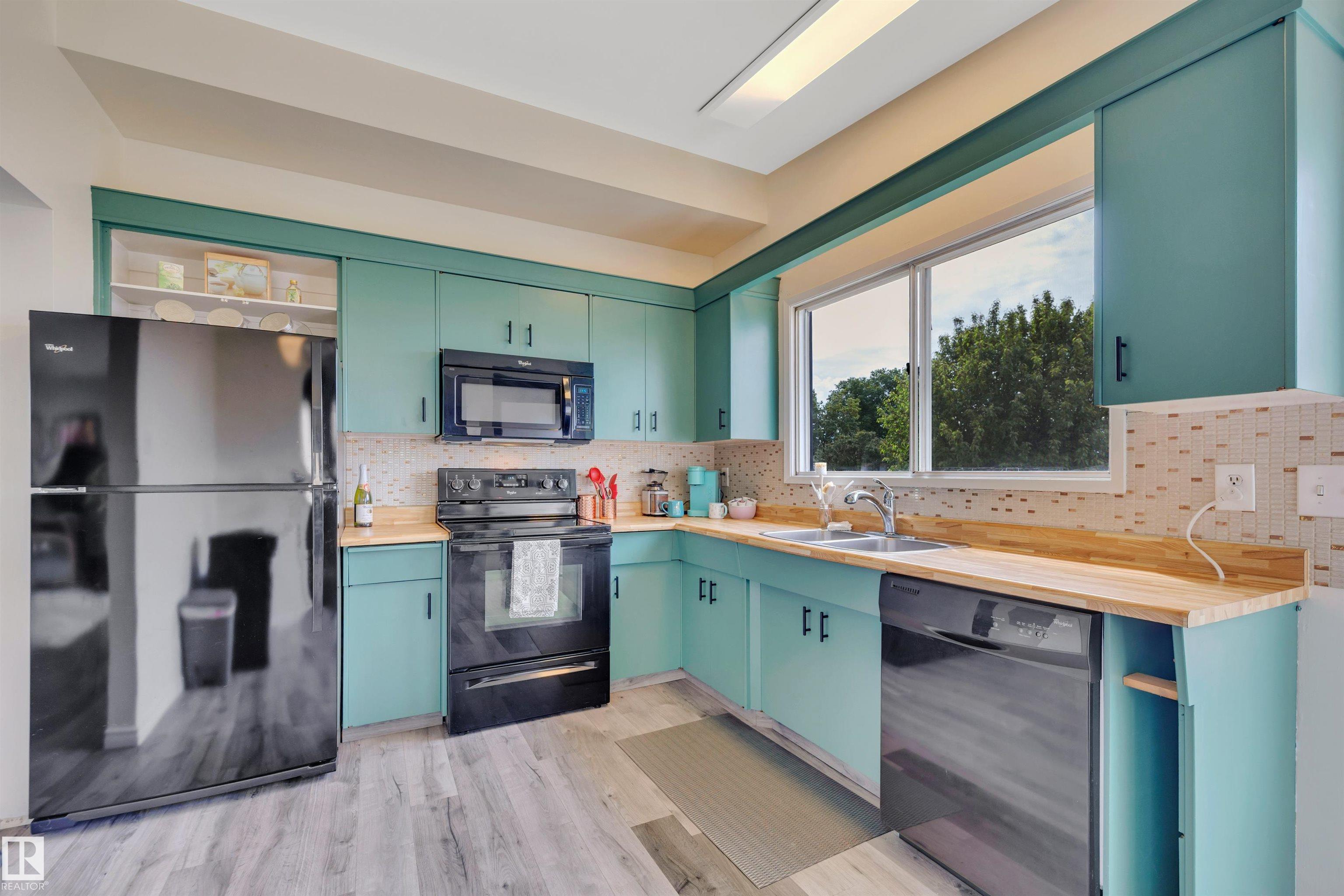 Photo 16 at 7719 144 Avenue NW, Kildare, Edmonton
