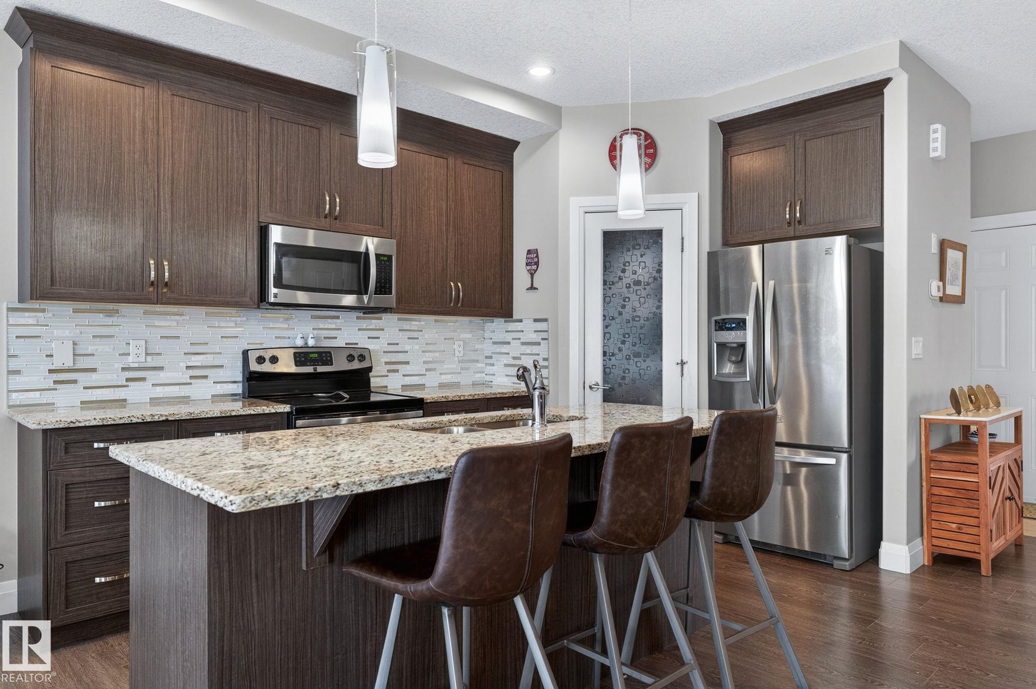 Photo 12 at 83 Sandalwood Place, Suntree, Leduc