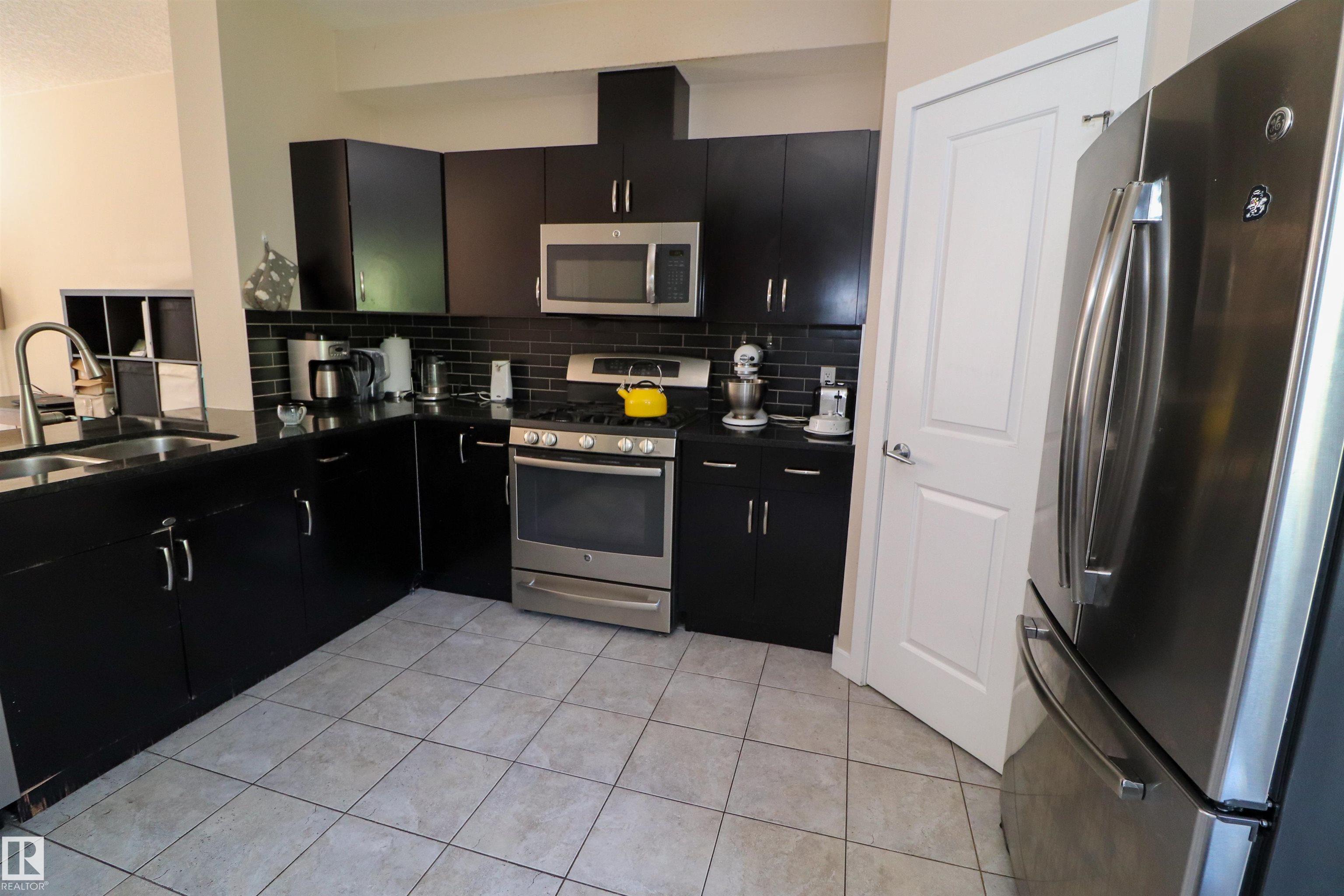 Photo 6 at 23 - 5873 Mullen Place NW, MacTaggart, Edmonton