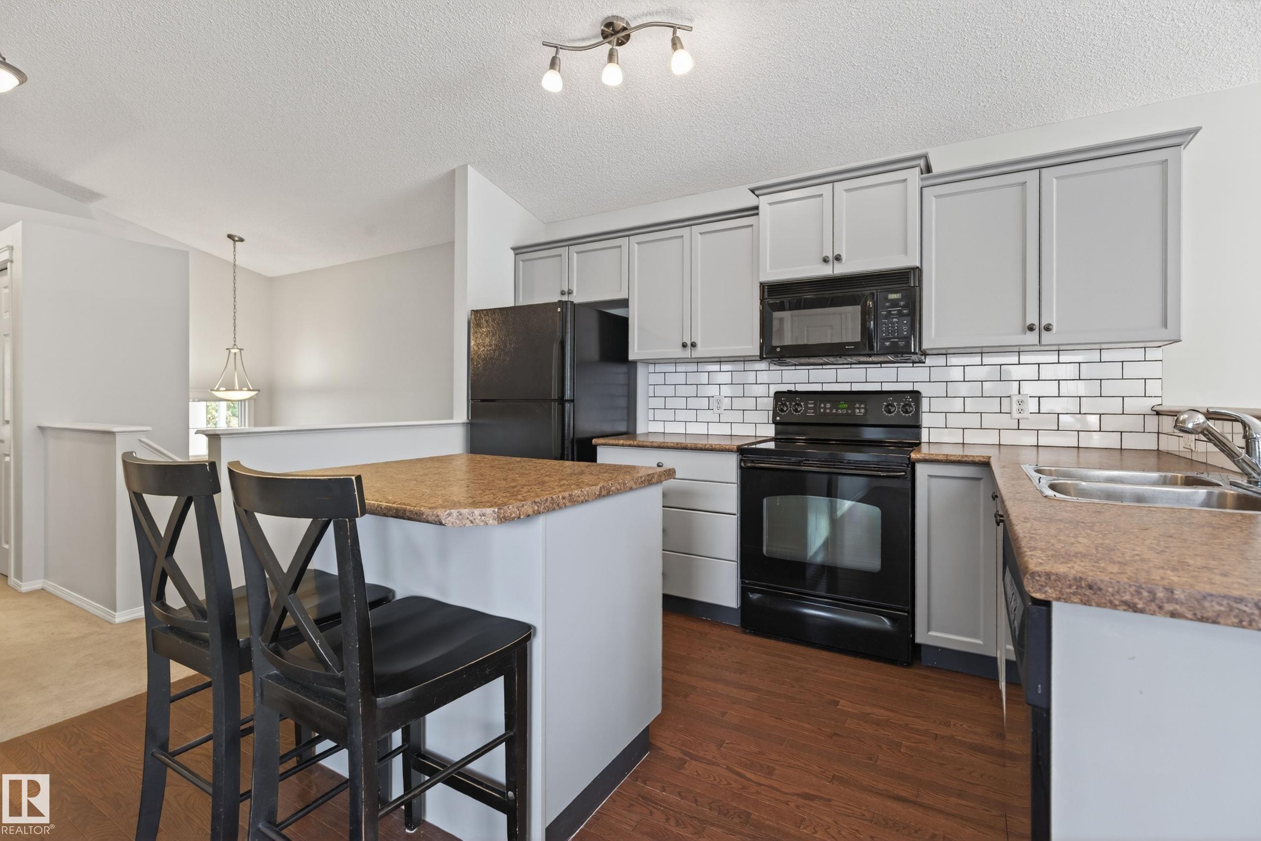 Photo 6 at 7815 14 Avenue SW, Summerside, Edmonton
