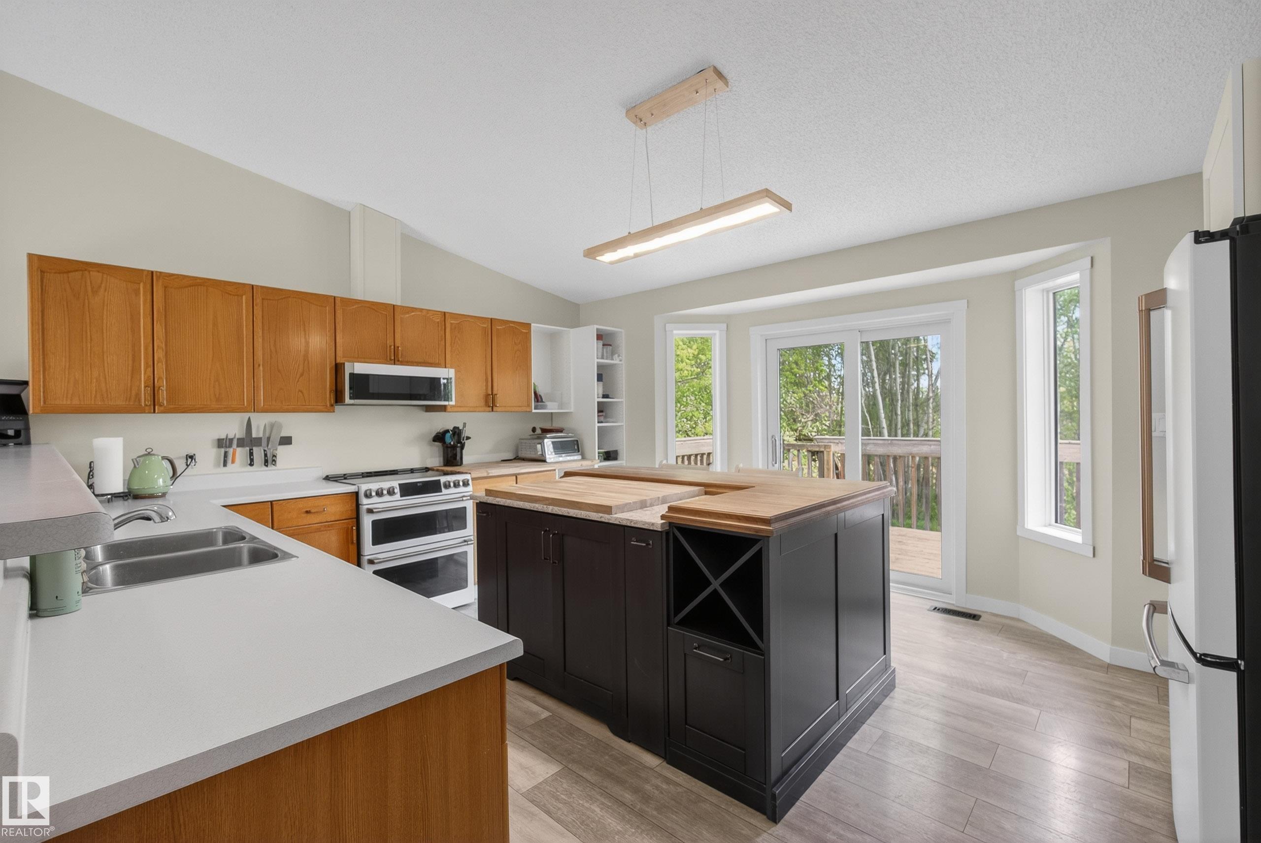 Photo 9 at 21 - 2228 Parkland Drive, Lake Country Prop., Rural Parkland County