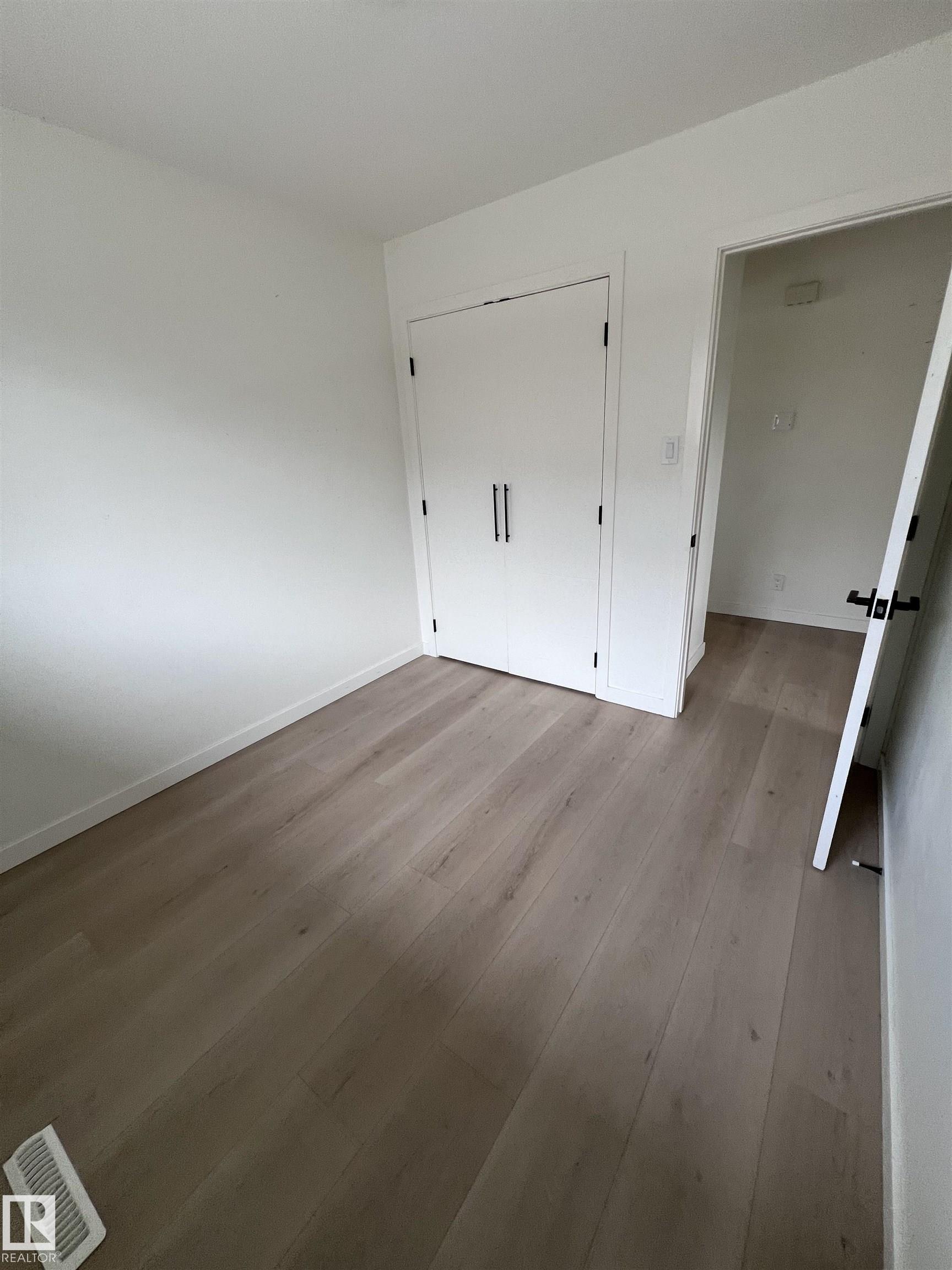 Photo 11 at 11911 133 Avenue NW, Kensington, Edmonton