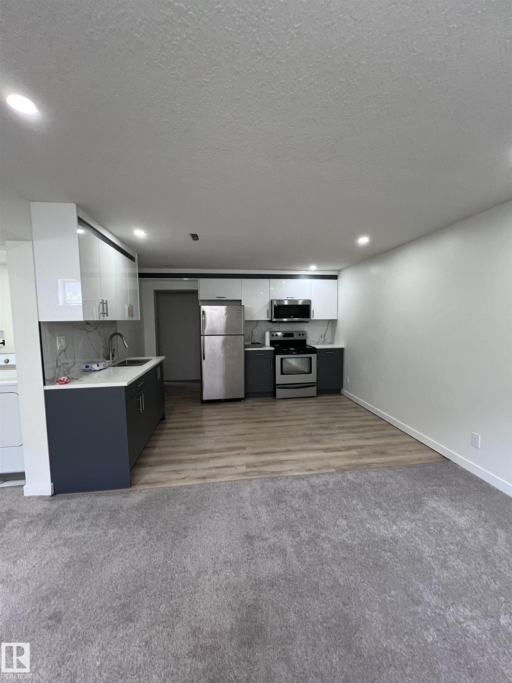 Photo 21 at 11911 133 Avenue NW, Kensington, Edmonton