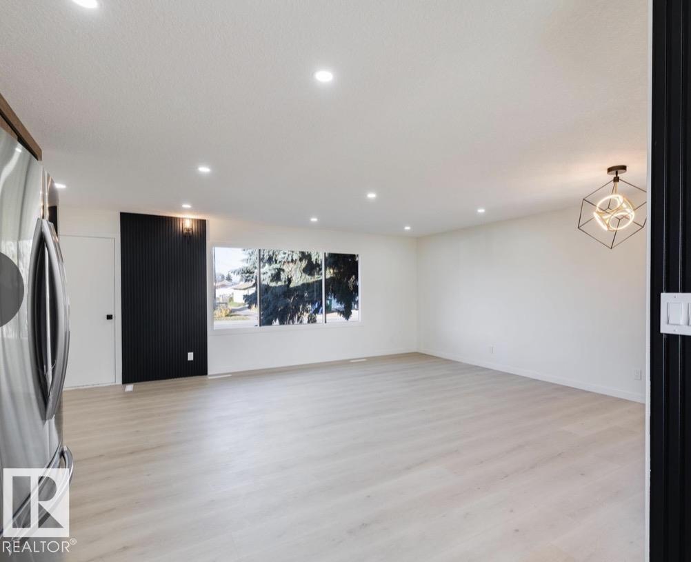 Photo 6 at 11911 133 Avenue NW, Kensington, Edmonton