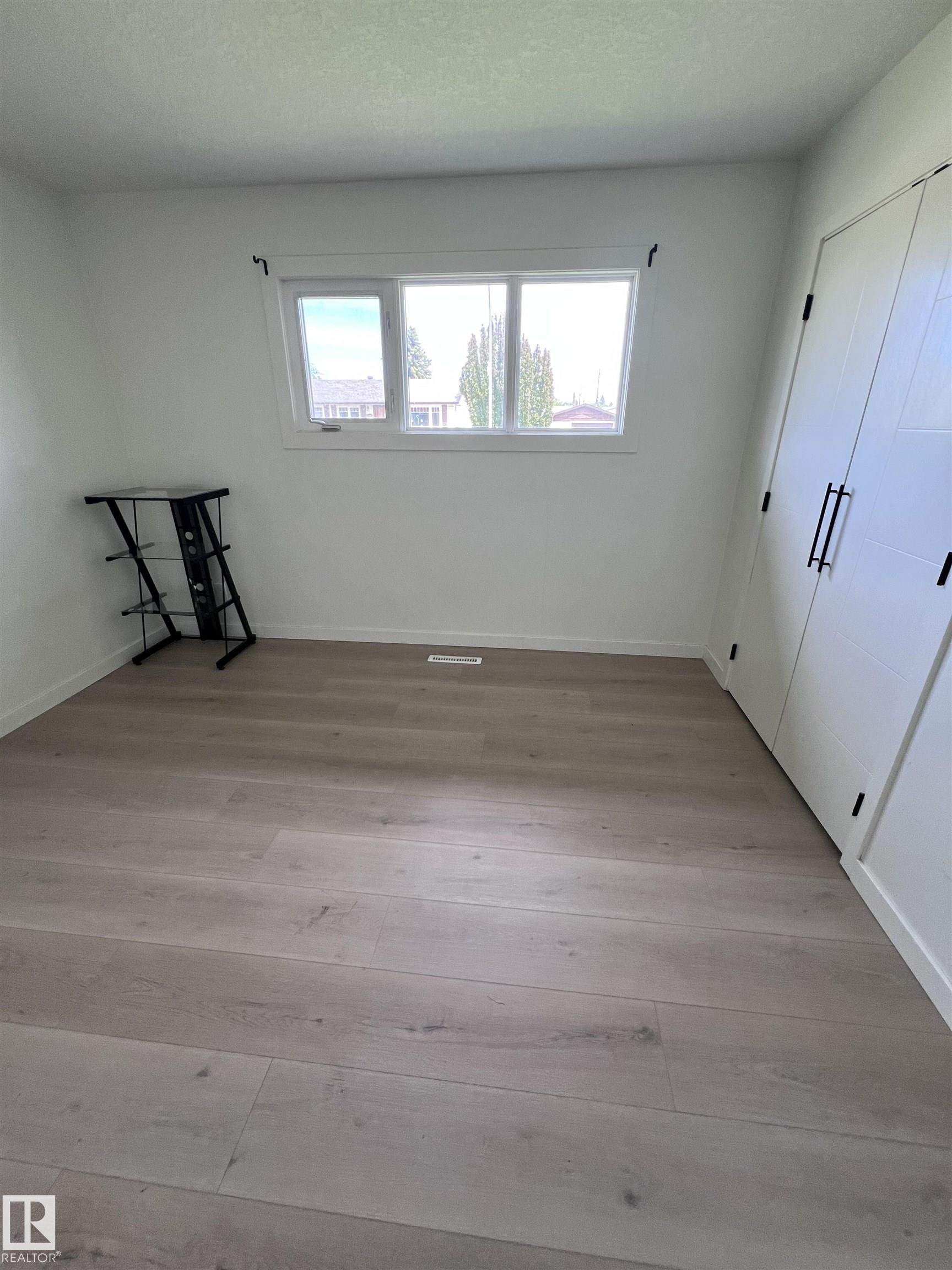Photo 9 at 11911 133 Avenue NW, Kensington, Edmonton