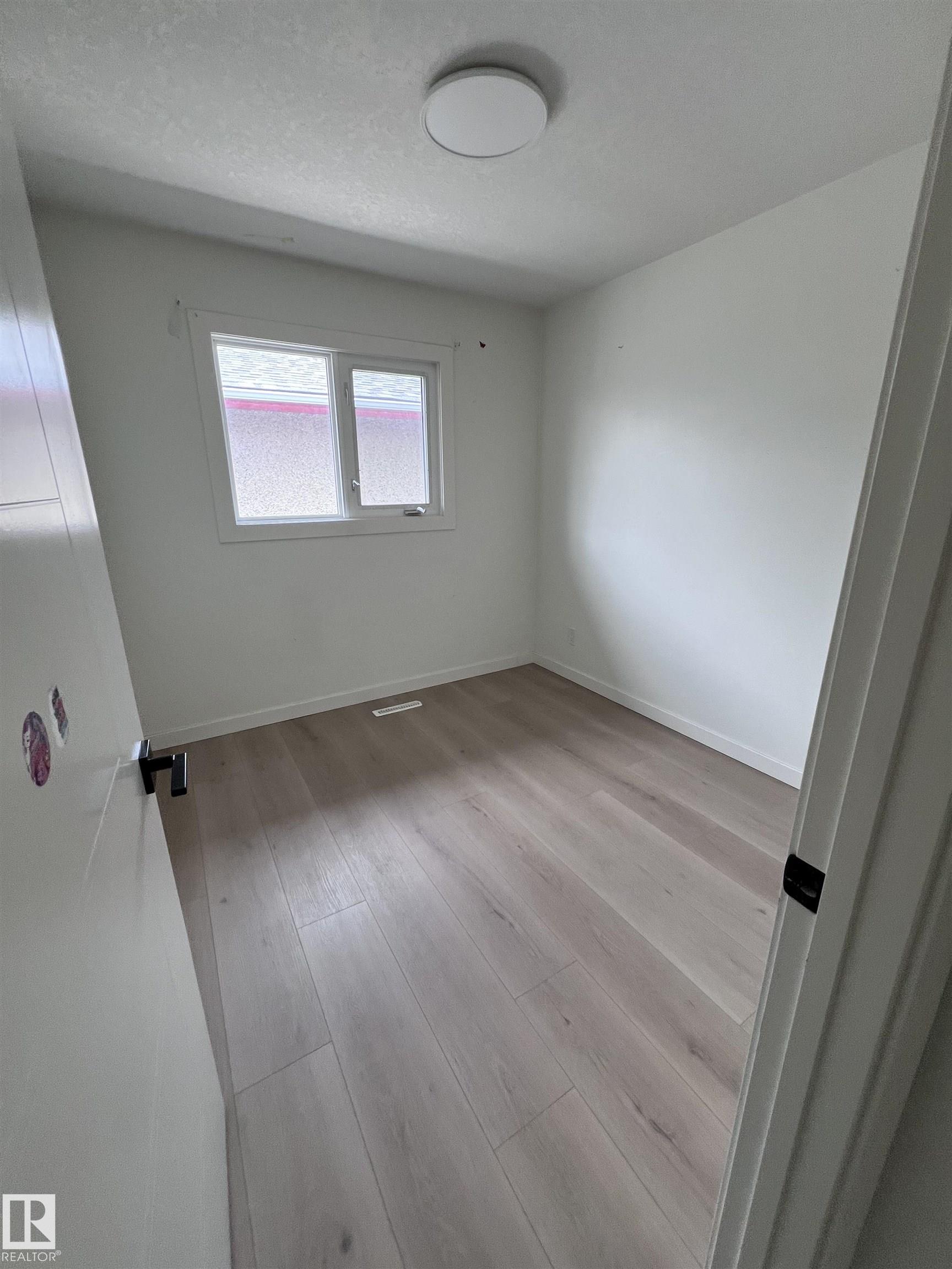 Photo 10 at 11911 133 Avenue NW, Kensington, Edmonton