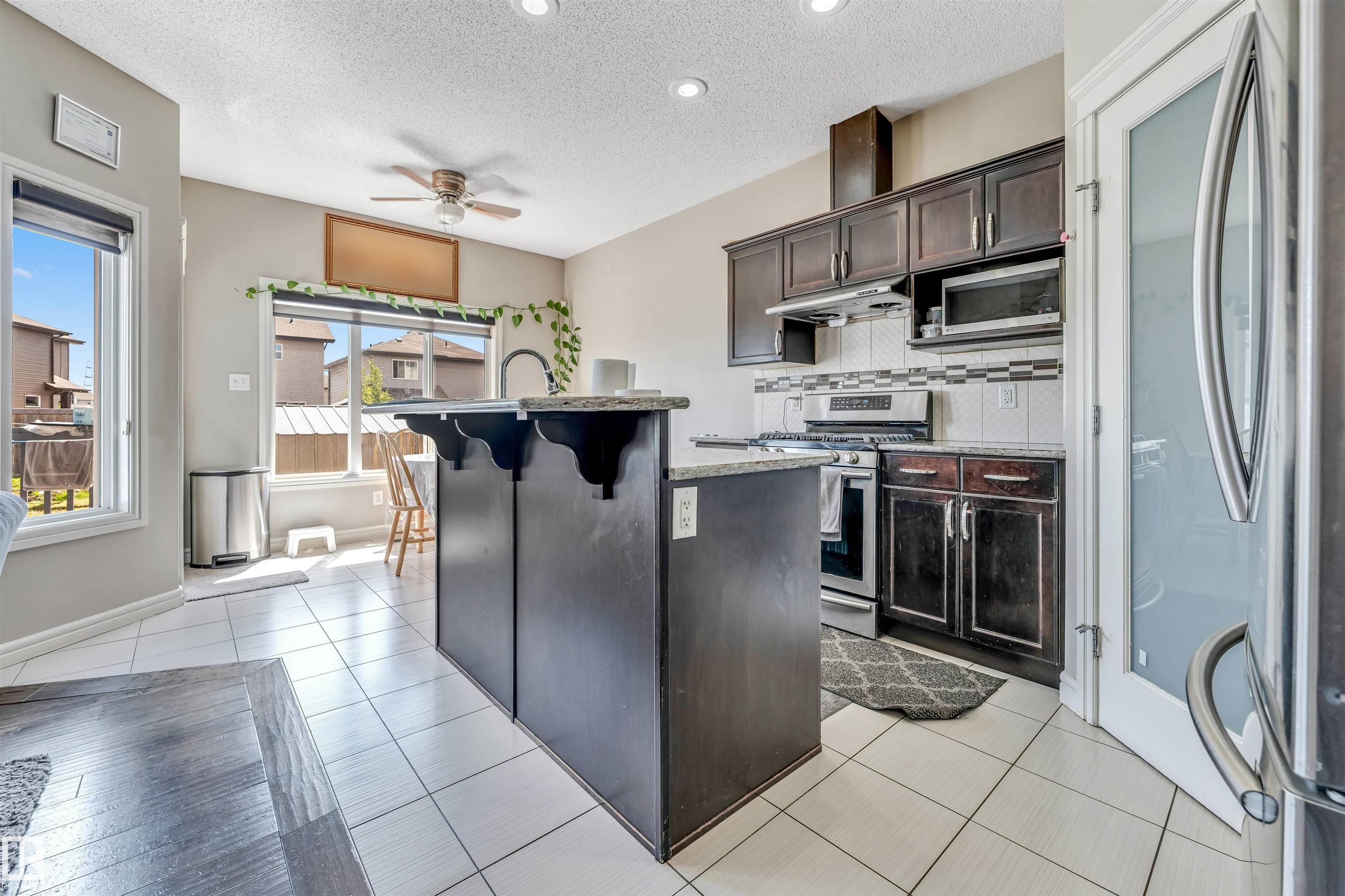 Photo 7 at 2903 16 Avenue NW, Laurel, Edmonton