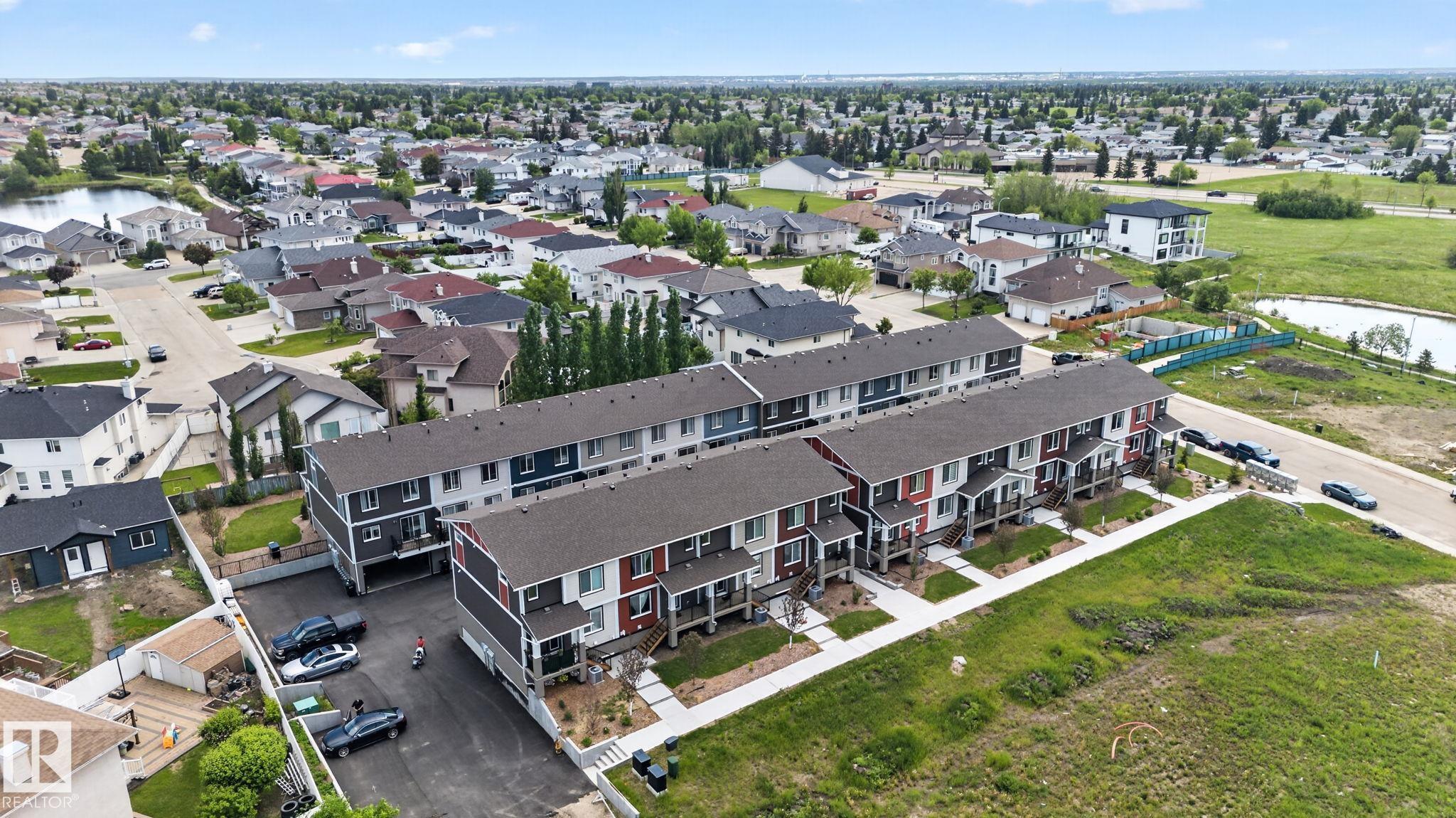 Photo 45 at 16 - 9250 156 Avenue NW, Eaux Claires, Edmonton