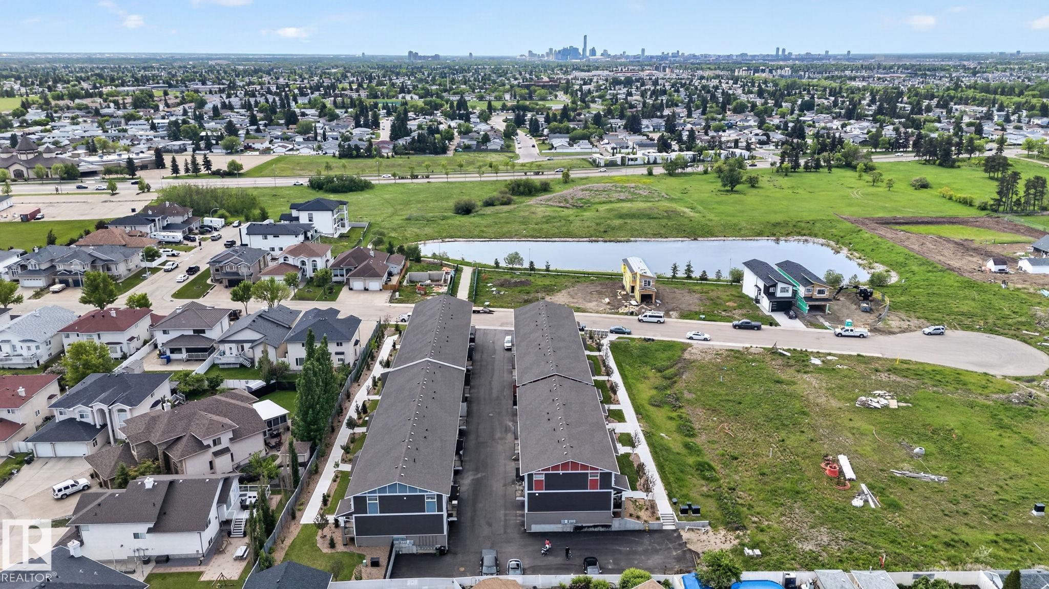 Photo 46 at 16 - 9250 156 Avenue NW, Eaux Claires, Edmonton