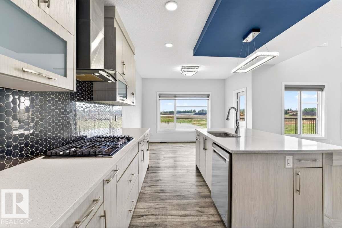 Photo 14 at 577 Boulder Wynd, Black Stone, Leduc